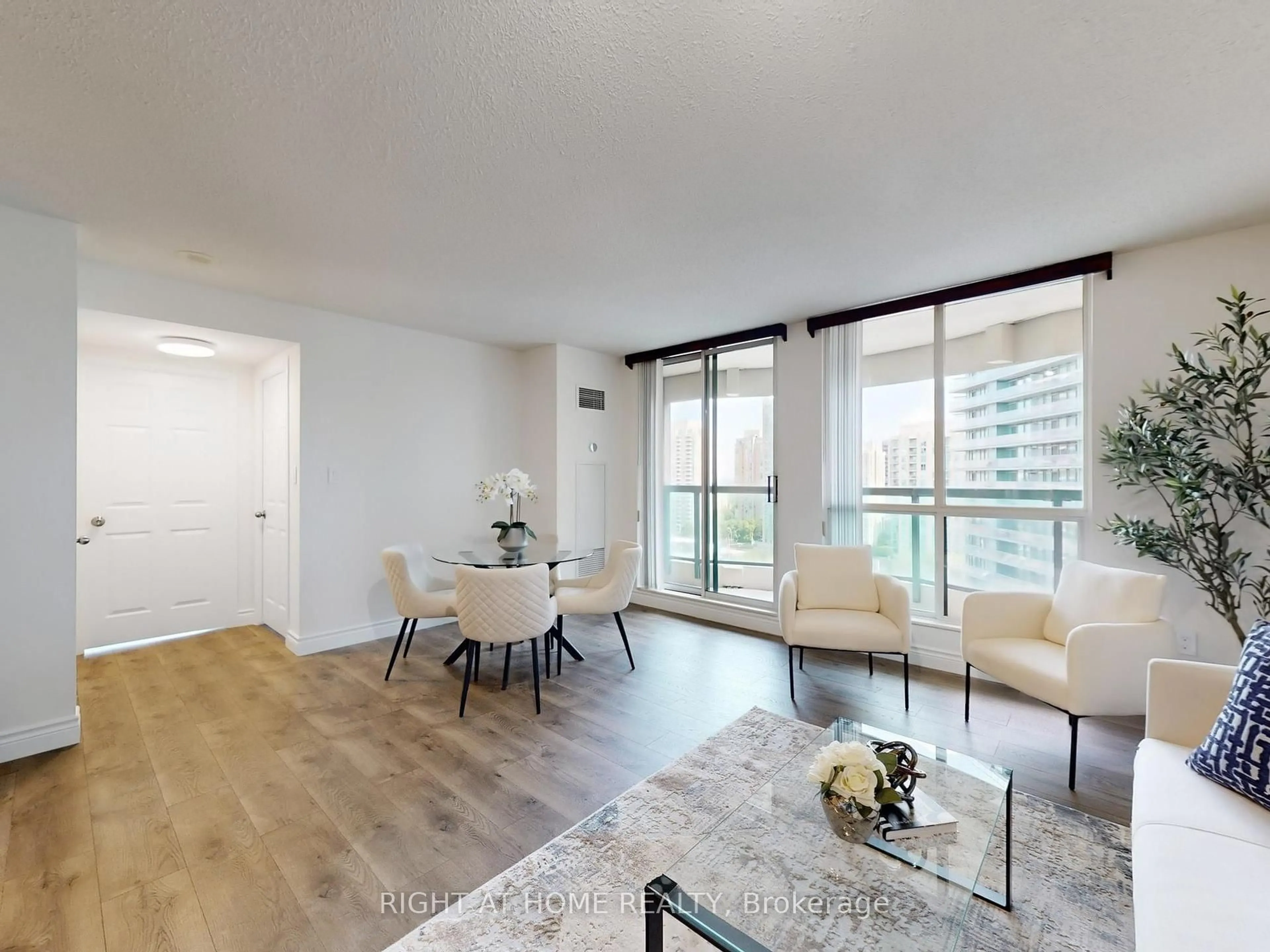 Living room with furniture, wood/laminate floor for 23 Lorraine Dr #1913, Toronto Ontario M2N 6Z6