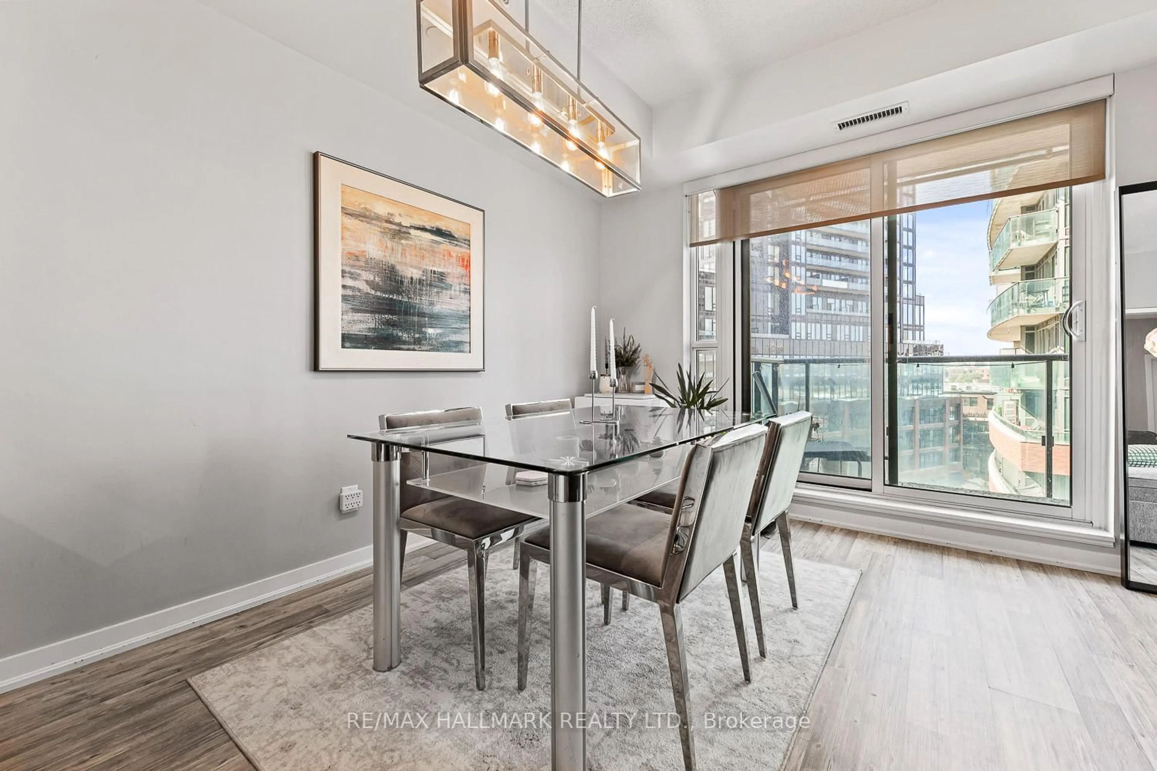 Dining room, wood/laminate floor for 69 Lynn Williams St #709, Toronto Ontario M6K 3R7