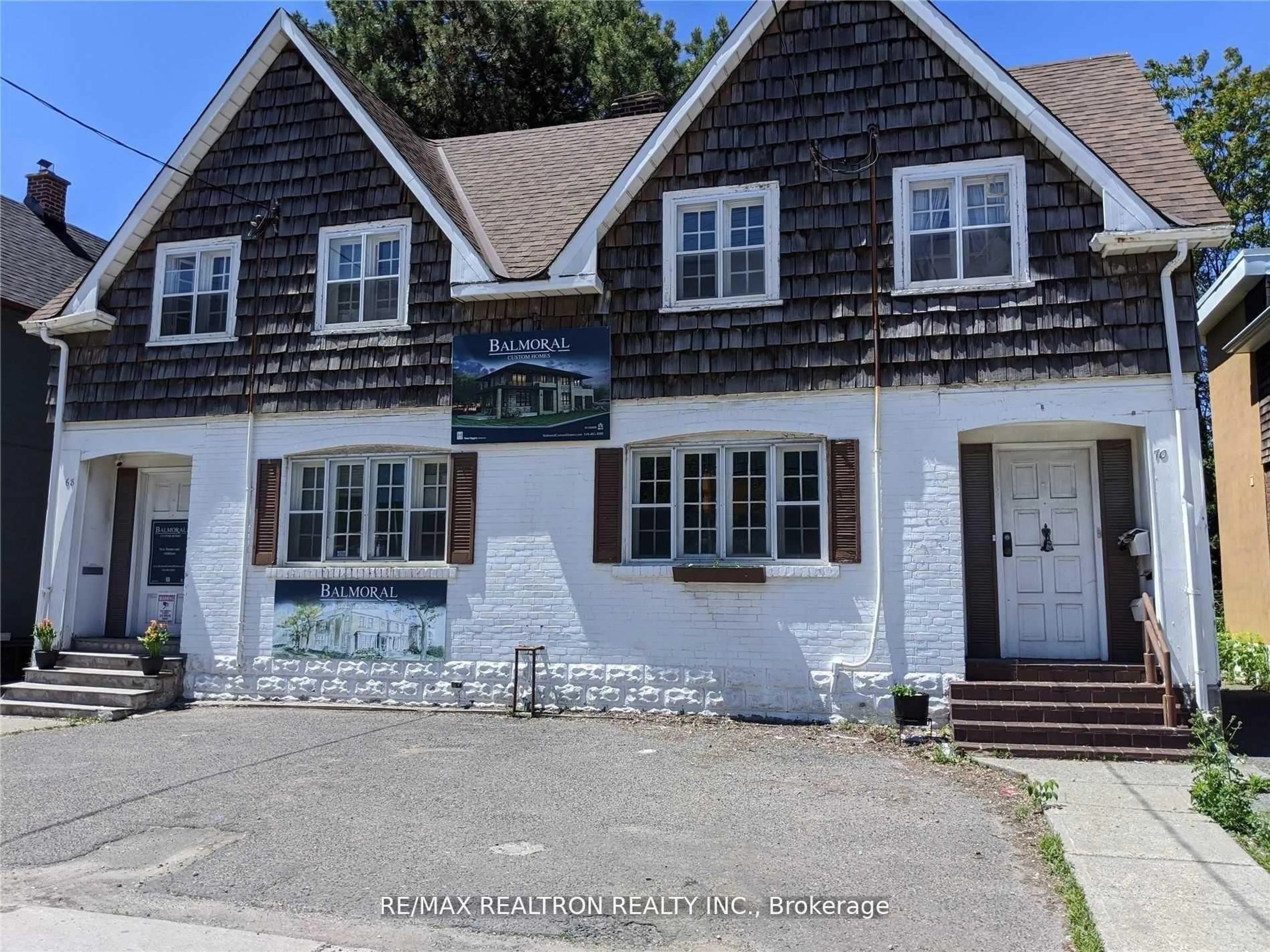 A pic from outside/outdoor area/front of a property/back of a property/a pic from drone, street for 68-70 Laird Dr, Toronto Ontario M4G 3V1