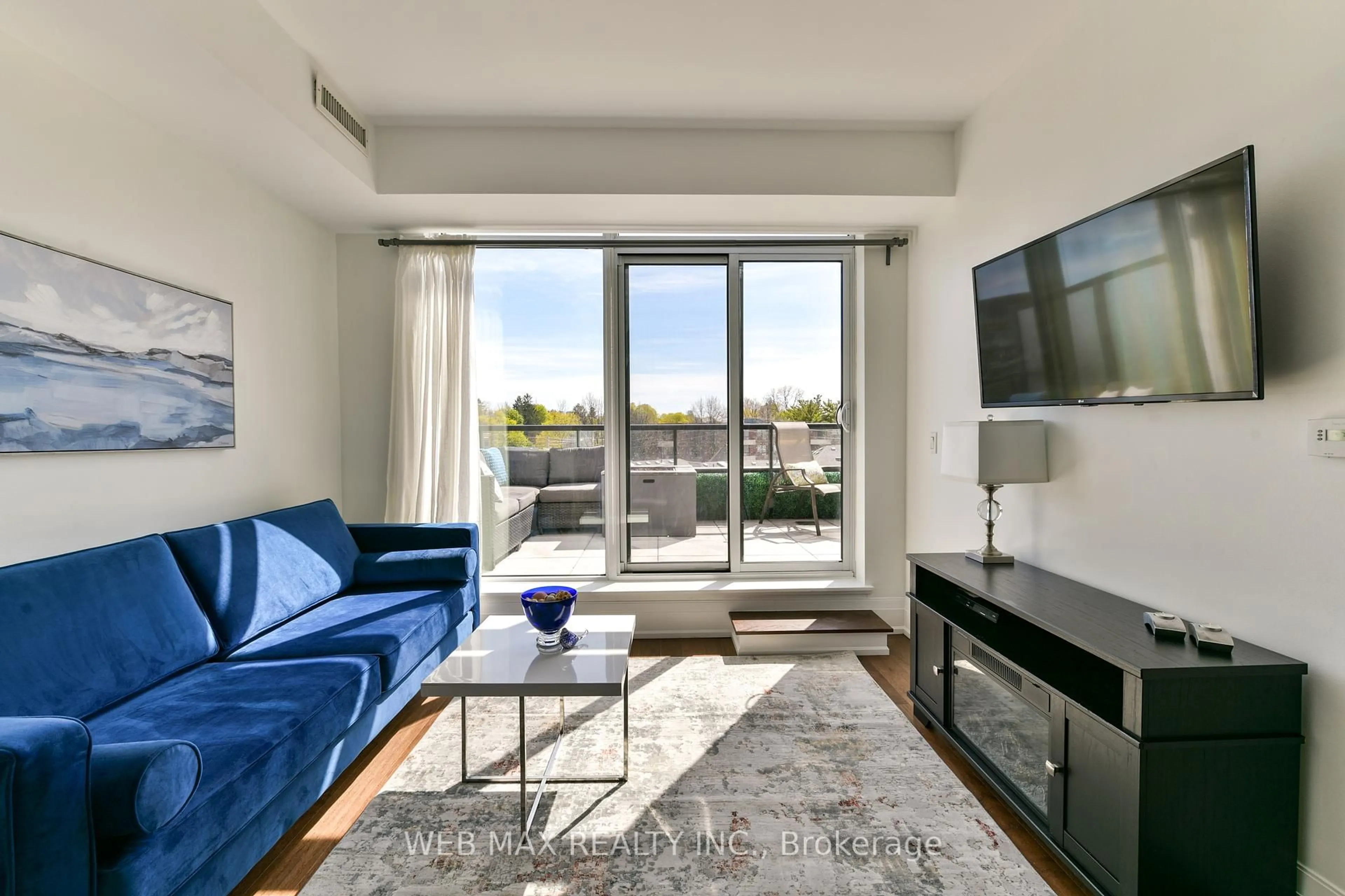 Living room with furniture, unknown for 25 Malcolm Rd #501, Toronto Ontario M4G 0C1