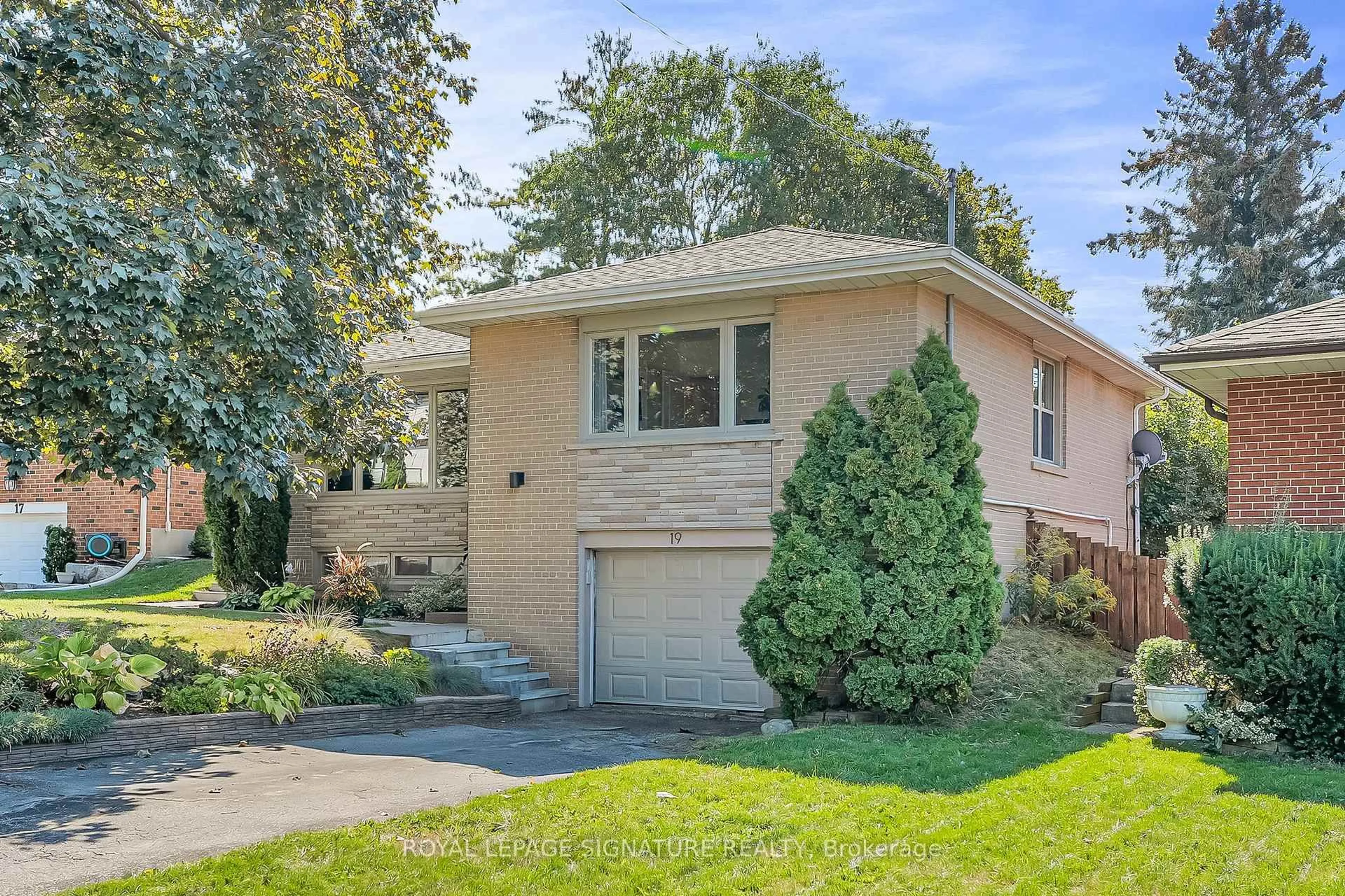 Home with brick exterior material, street for 19 Caronport Cres, Toronto Ontario M3A 1G9