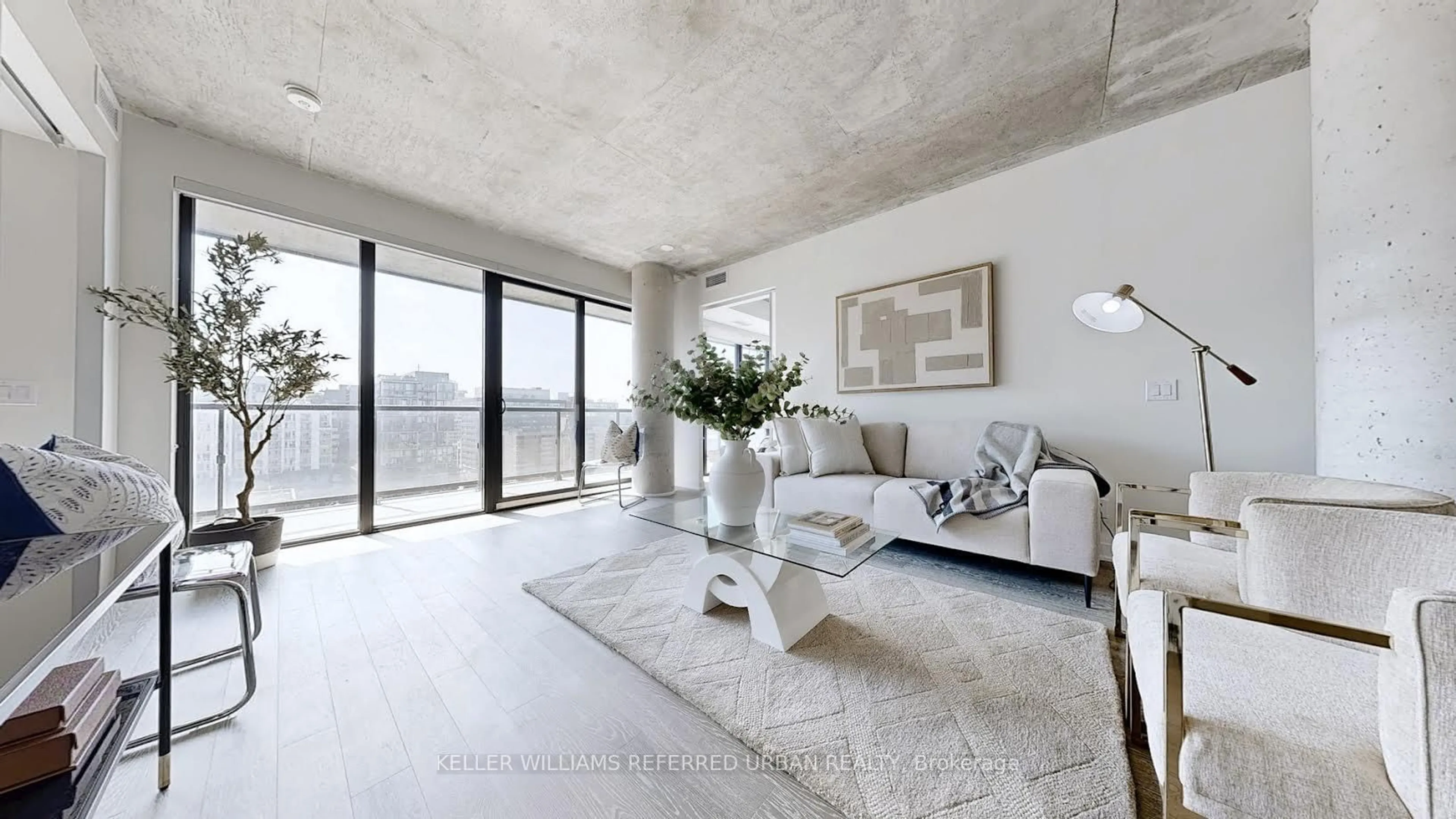 Living room with furniture, cement floor for 608 Richmond St #1206, Toronto Ontario M5V 0N9