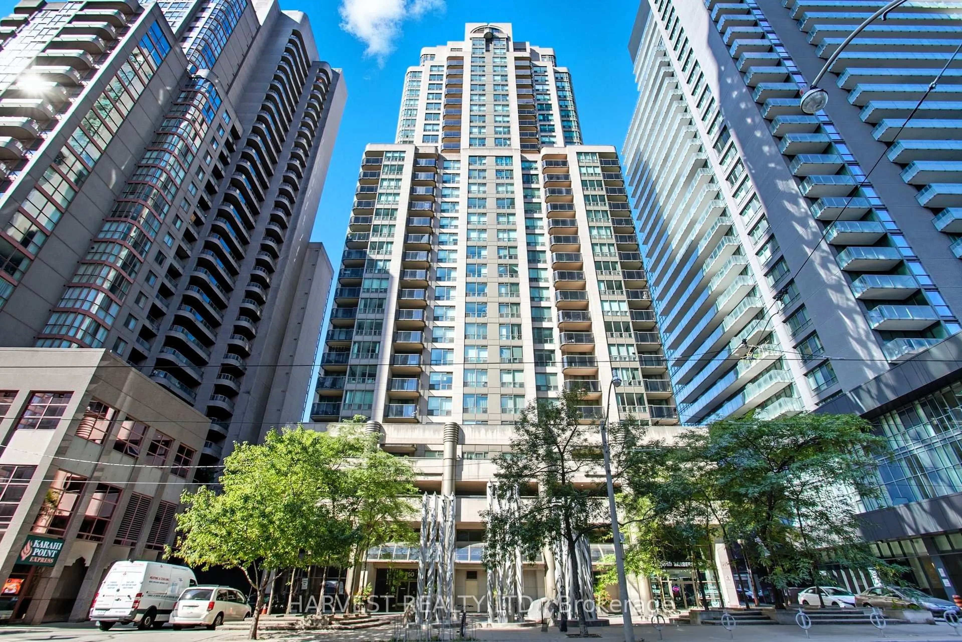 Patio, city buildings view from balcony for 750 Bay St #3303, Toronto Ontario M5G 1N6