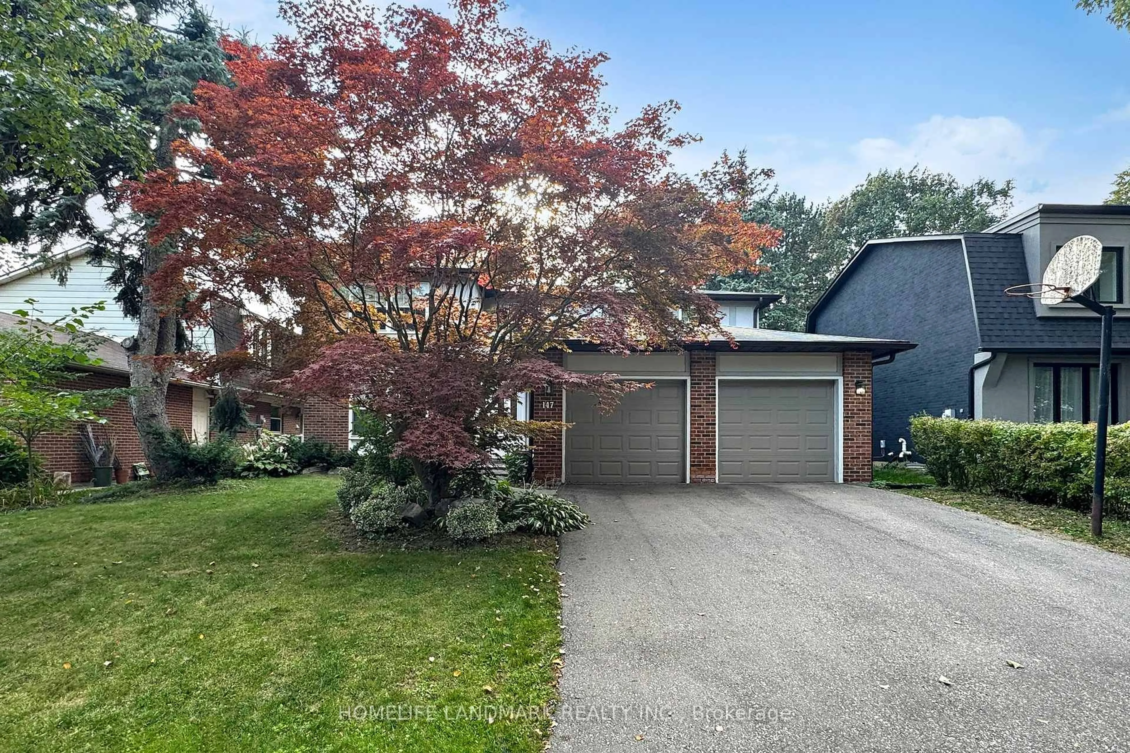 Home with brick exterior material, street for 147 Mossgrove Tr, Toronto Ontario M2L 2W6