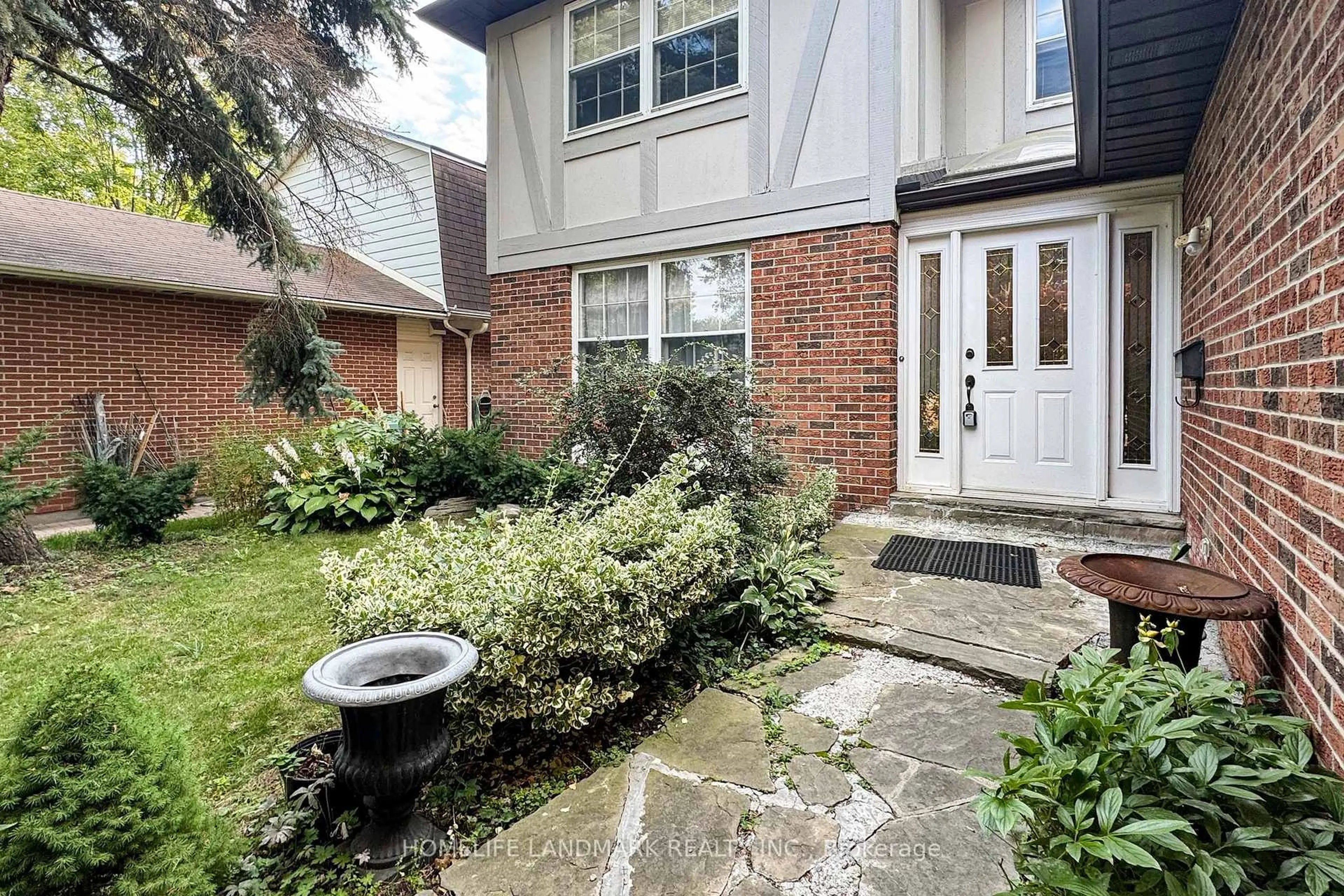 Home with brick exterior material, street for 147 Mossgrove Tr, Toronto Ontario M2L 2W6