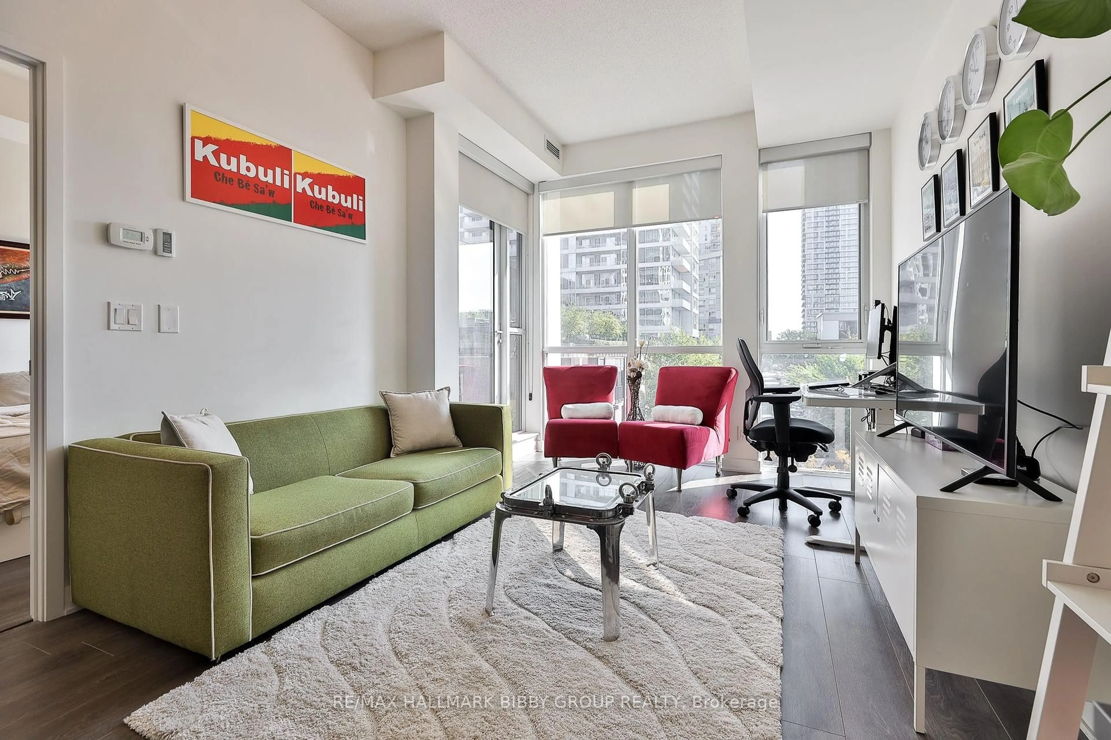 Living room with furniture, carpet floor for 170 Sumach St #307, Toronto Ontario M5A 0C3