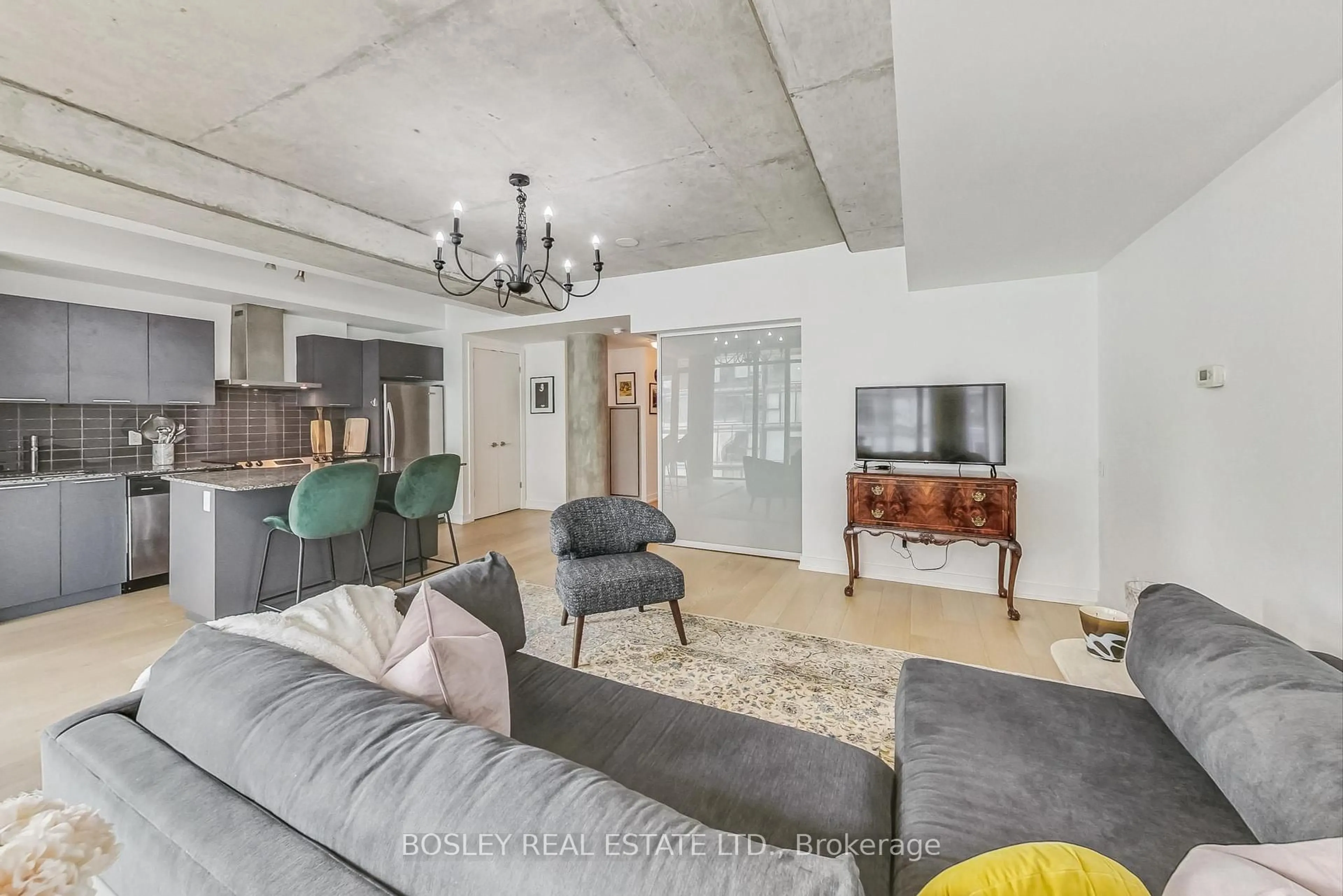 Living room with furniture, cement floor for 650 King St #711, Toronto Ontario M5V 0H6