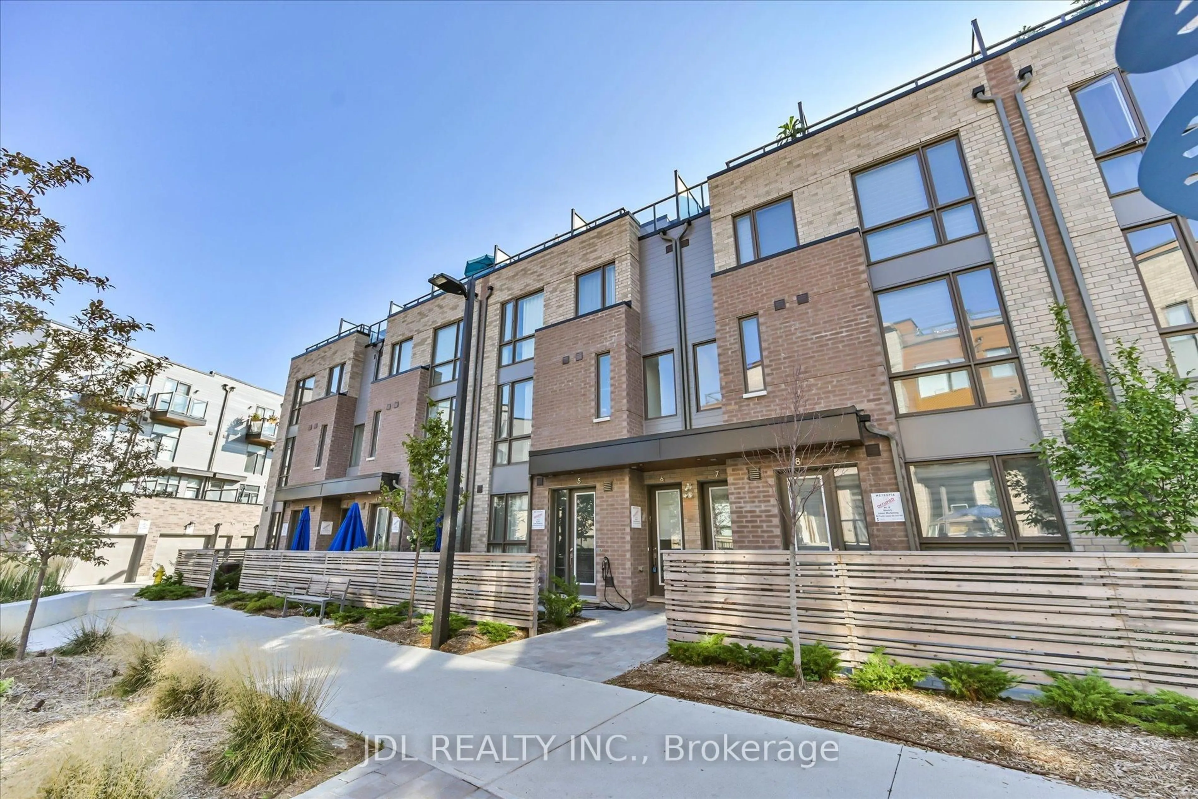 Home with brick exterior material, street for 88 Turtle Island Rd #7, Toronto Ontario M6A 0E4