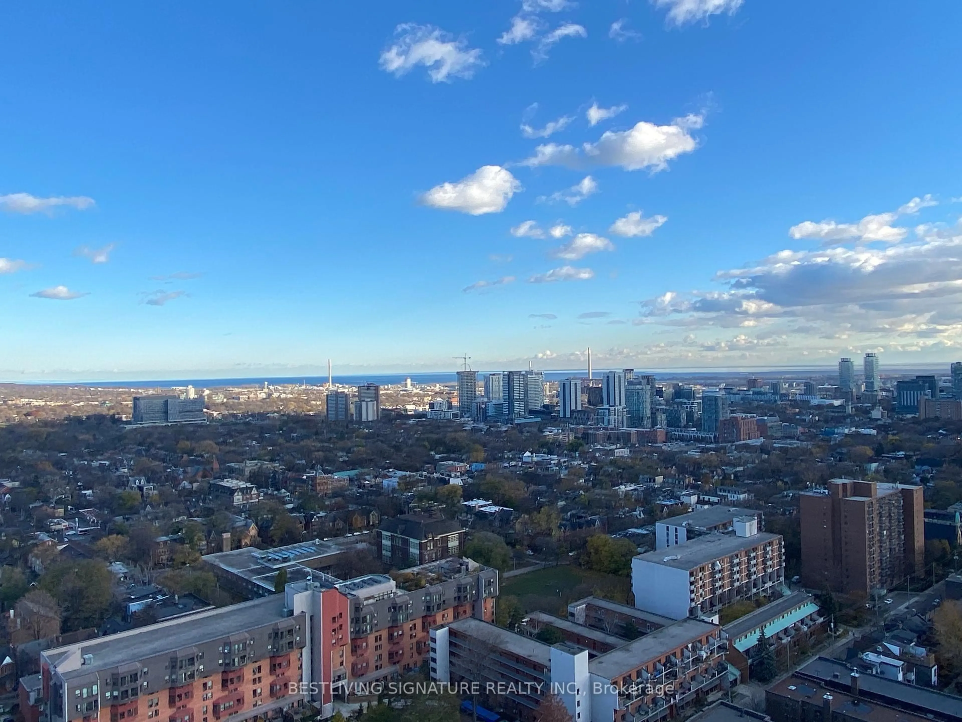 A pic from outside/outdoor area/front of a property/back of a property/a pic from drone, city buildings view from balcony for 159 Wellesley St #2703, Toronto Ontario M4Y 0H5