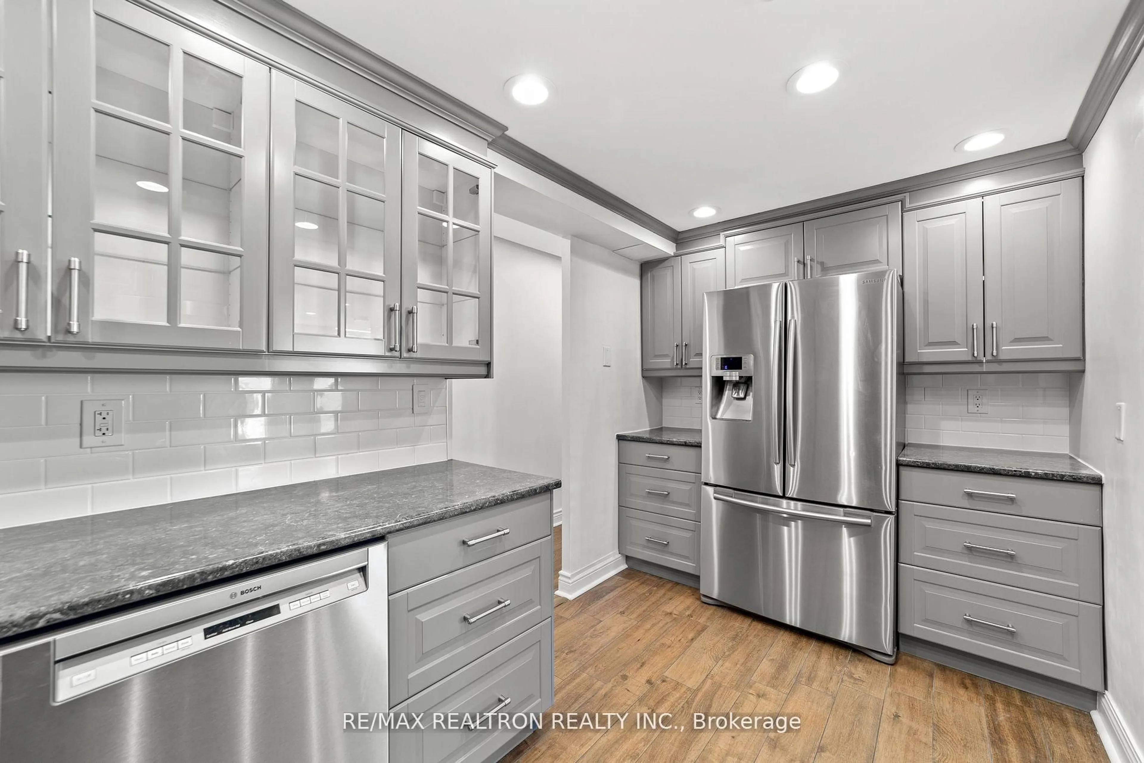 Contemporary kitchen, ceramic/tile floor for 130 Neptune Dr #702, Toronto Ontario M6A 1X5