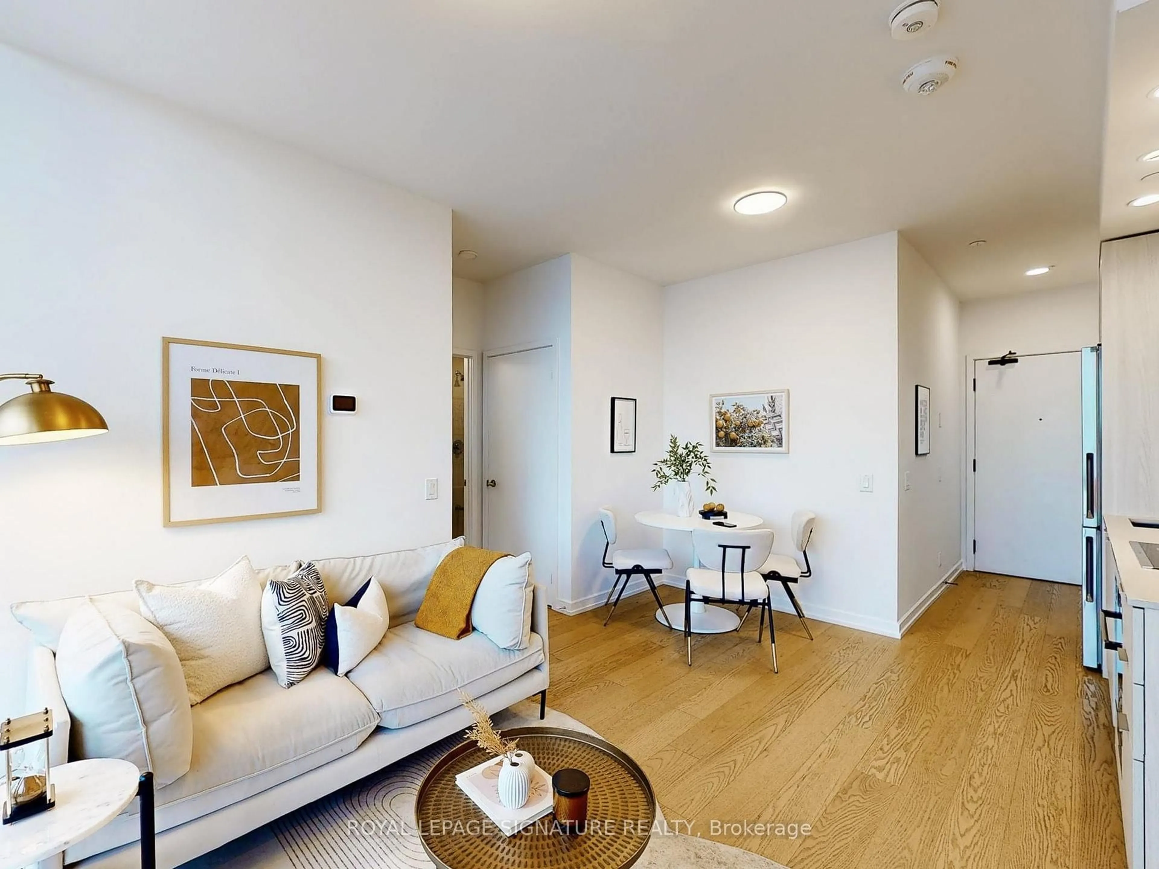 Living room with furniture, wood/laminate floor for 20 Tubman Ave #2616, Toronto Ontario M5A 0M8