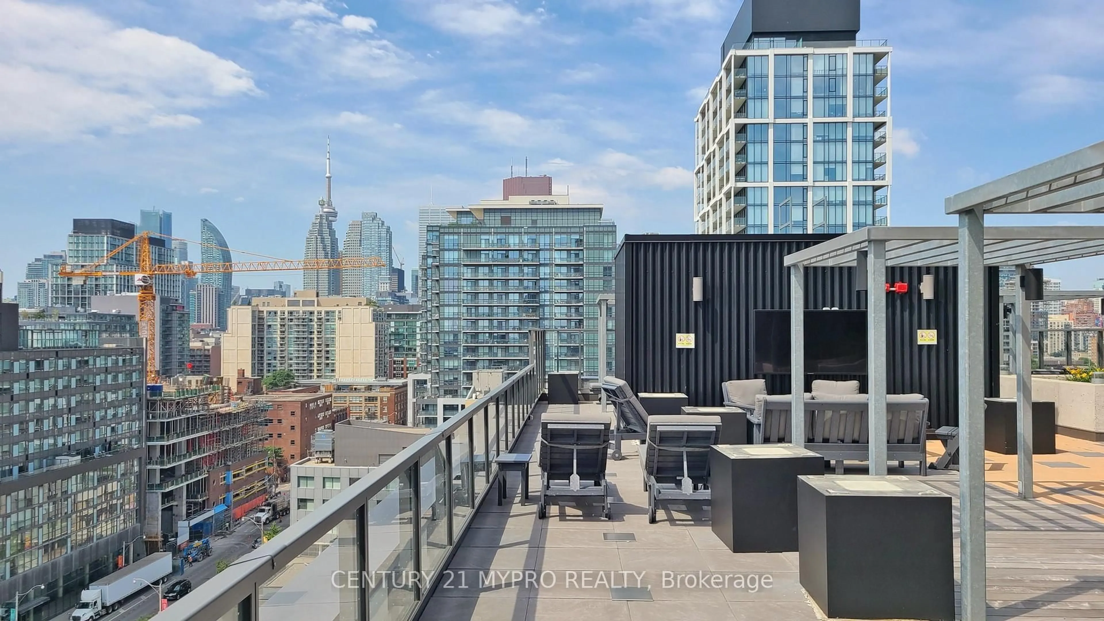 Patio, city buildings view from balcony for 120 Parliament St #404, Toronto Ontario M5A 0N6