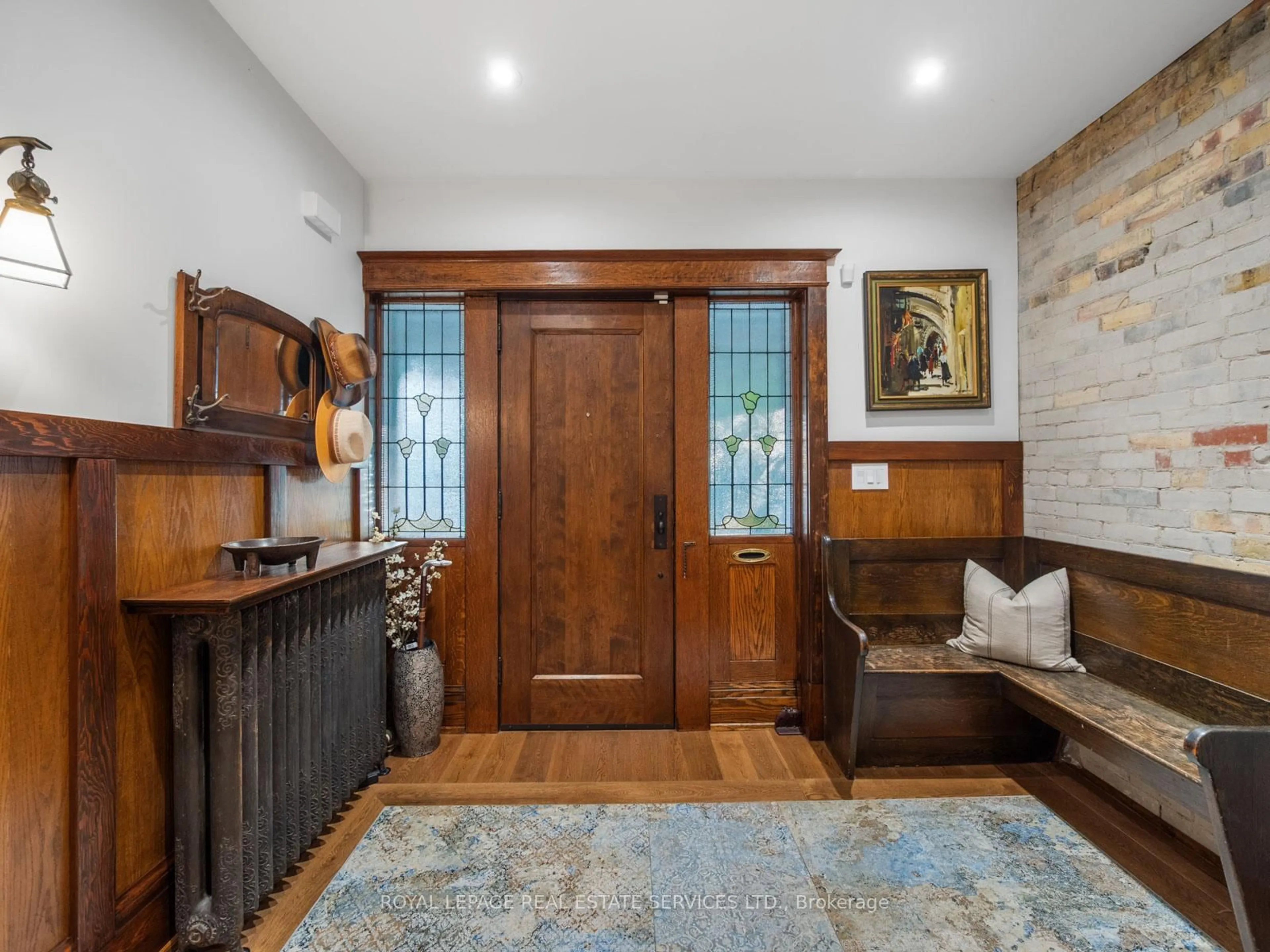 Indoor entryway for 303 Rusholme Rd, Toronto Ontario M6H 2Y9