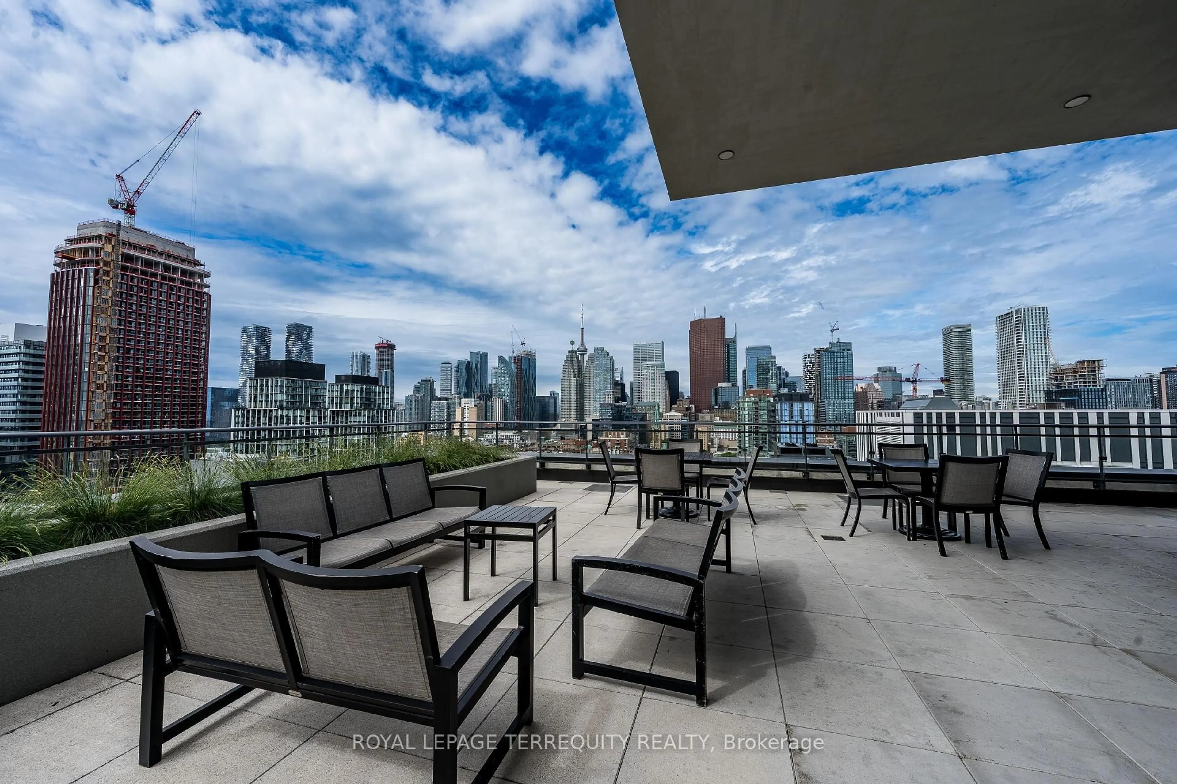 Patio, city buildings view from balcony for 460 Adelaide St #1032, Toronto Ontario M5A 0E7