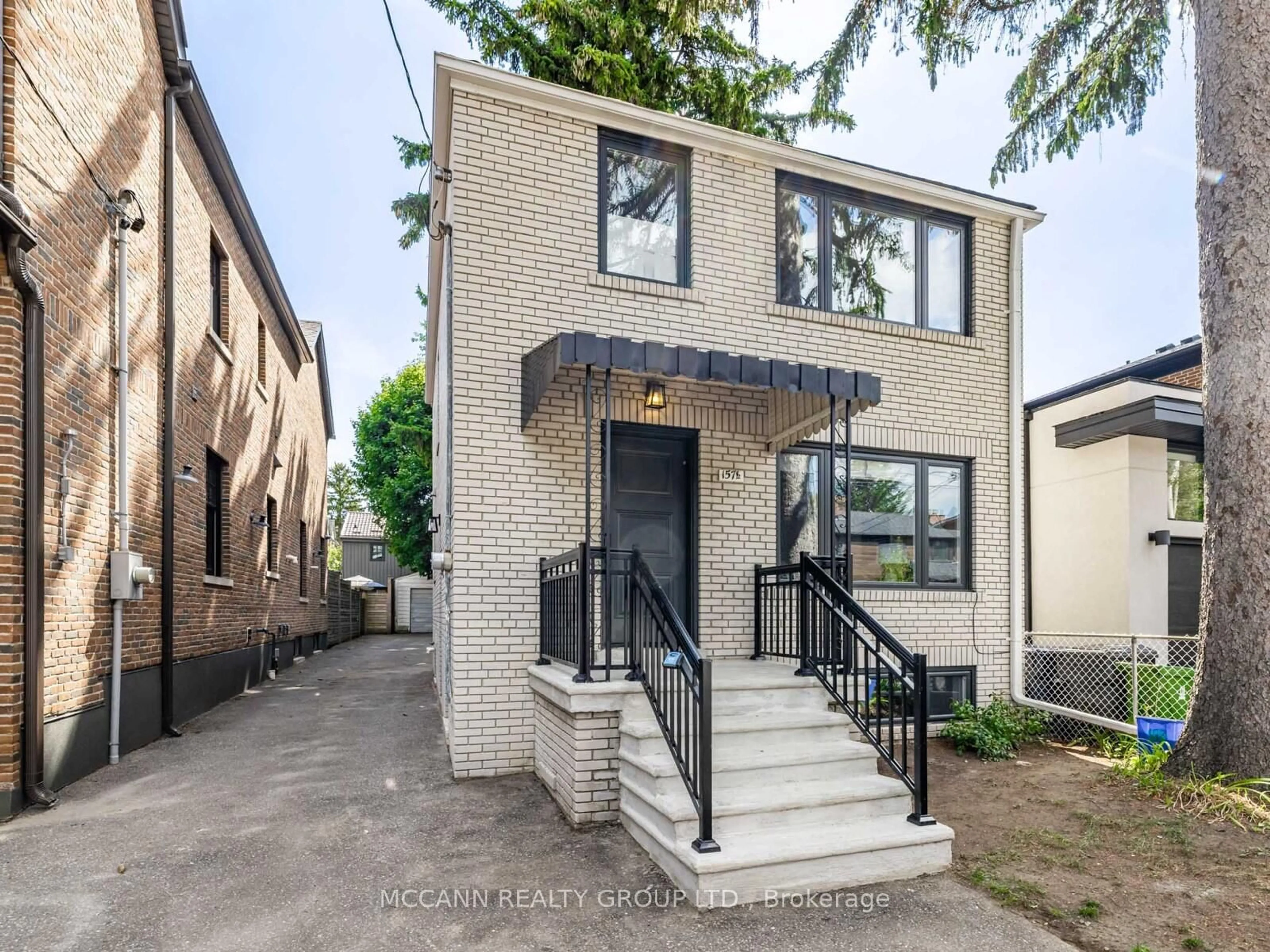 Home with brick exterior material, street for 157 1/2 Roslin Ave, Toronto Ontario M4N 1Z5