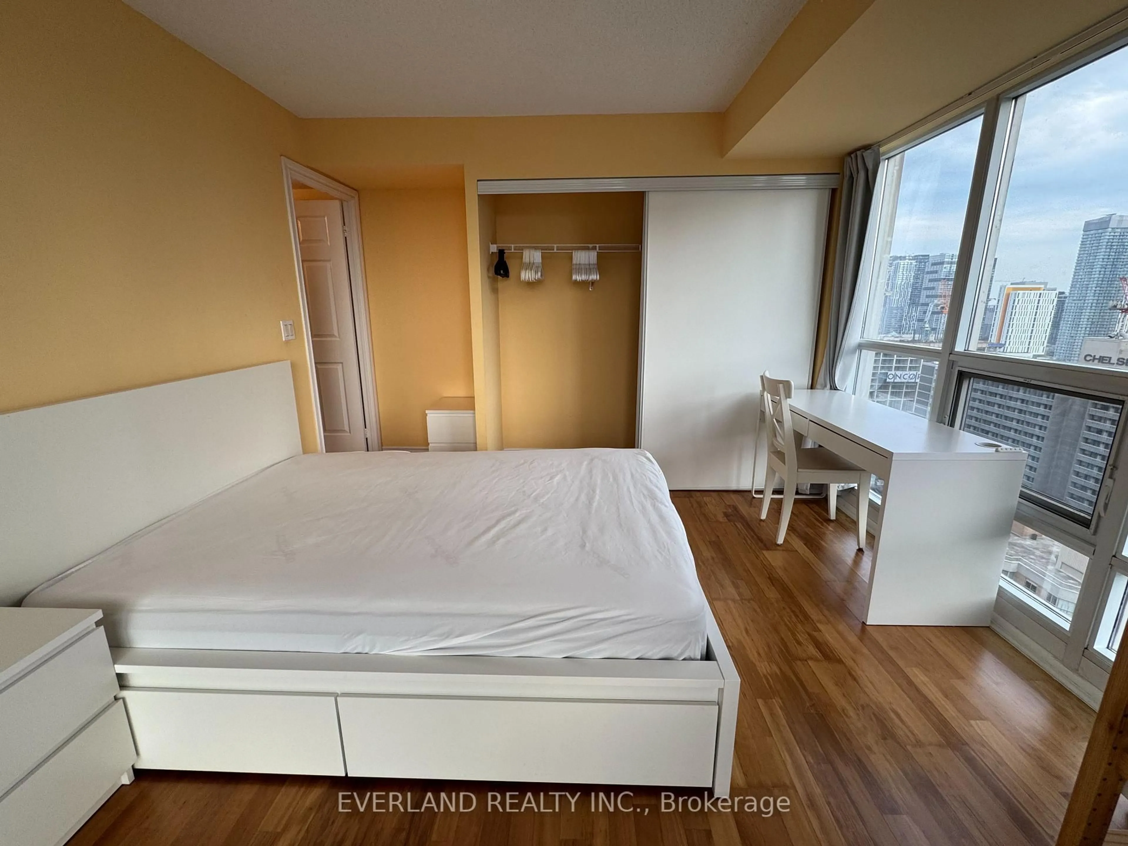 Bedroom with bed, wood/laminate floor for 761 Bay St #3009, Toronto Ontario M5G 2R2
