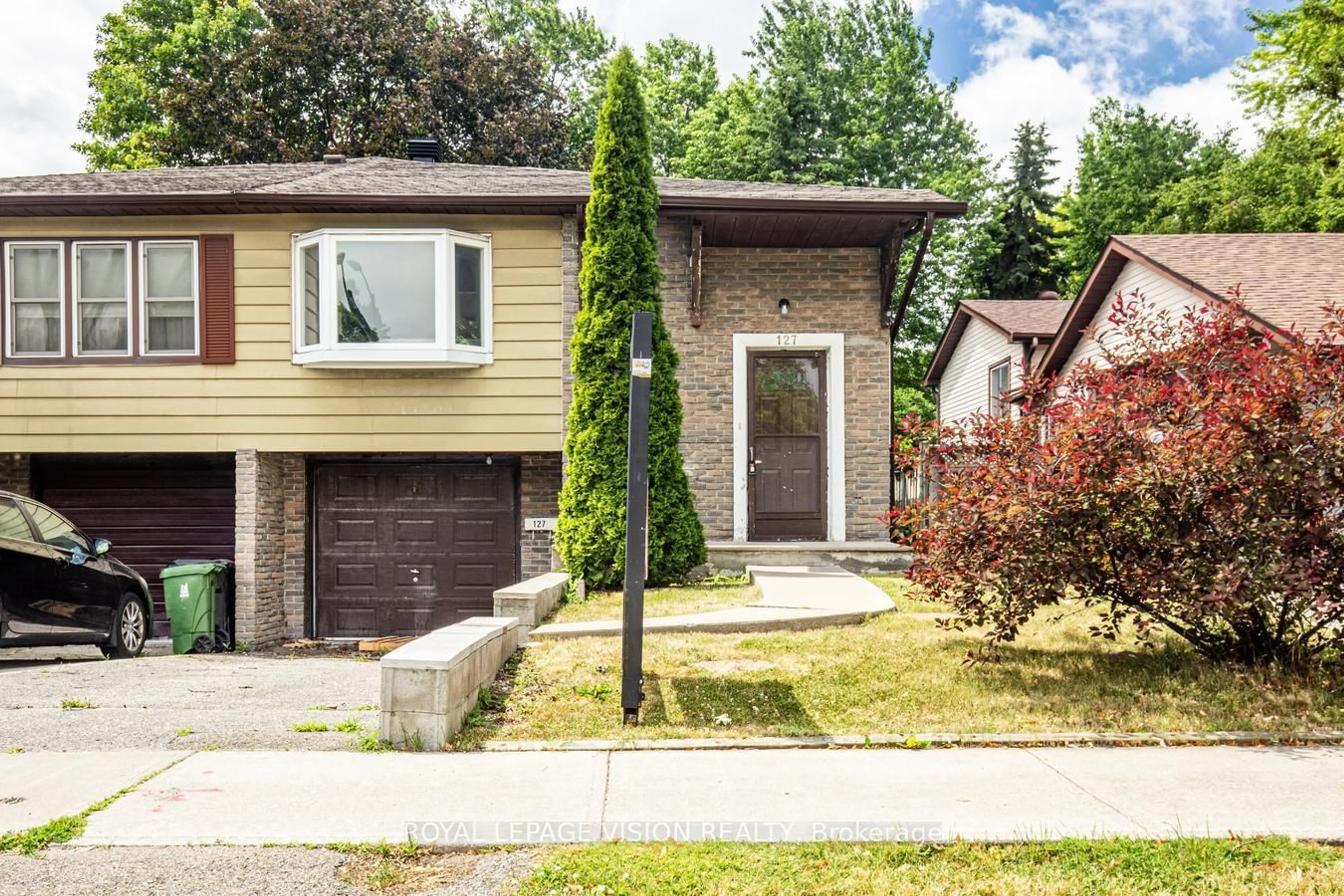 Home with brick exterior material, street for 127 Freshmeadow Dr, Toronto Ontario M2H 2P9