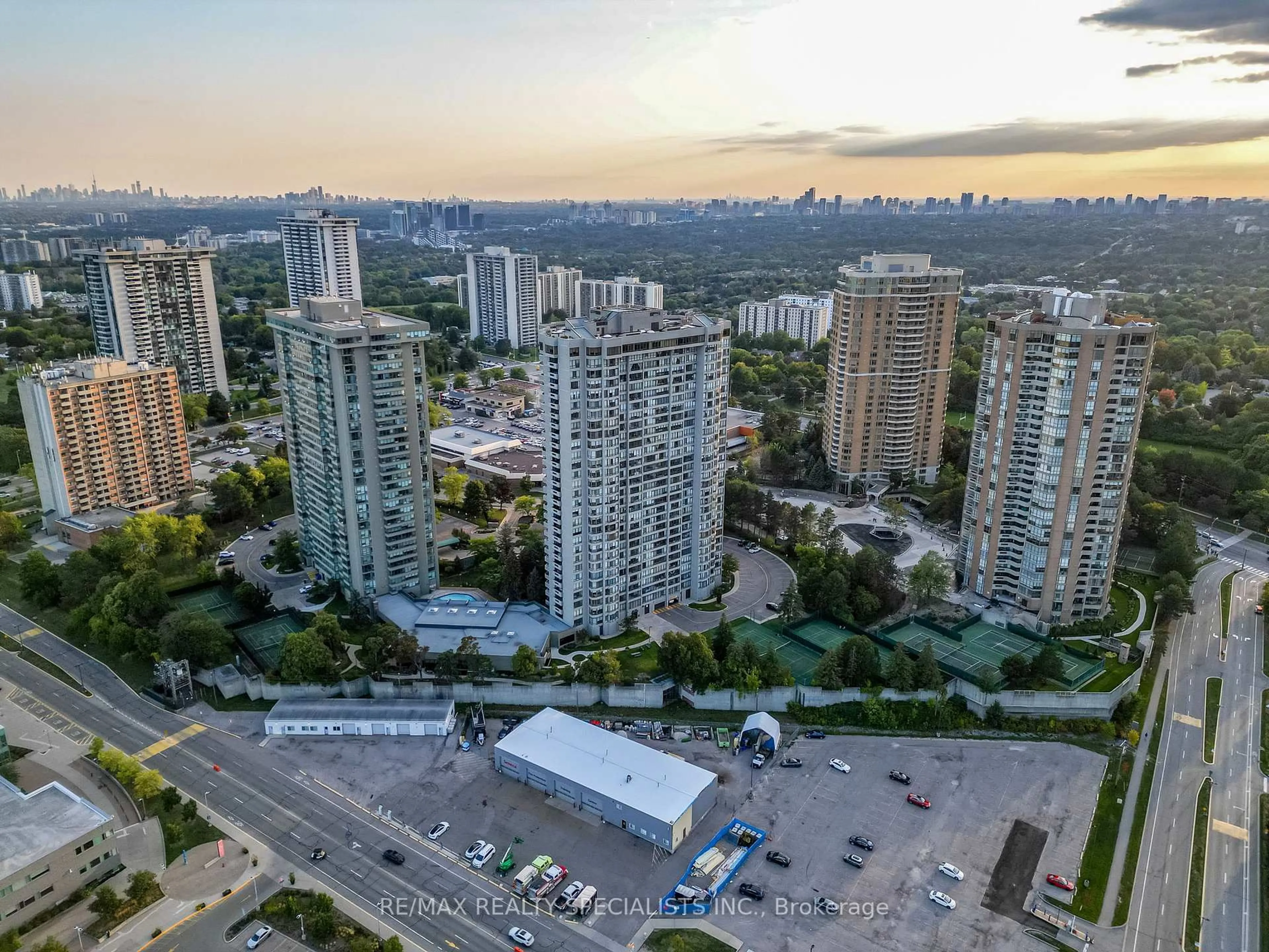 A pic from outside/outdoor area/front of a property/back of a property/a pic from drone, city buildings view from balcony for 65 Skymark Dr #201, Toronto Ontario M2H 3N9