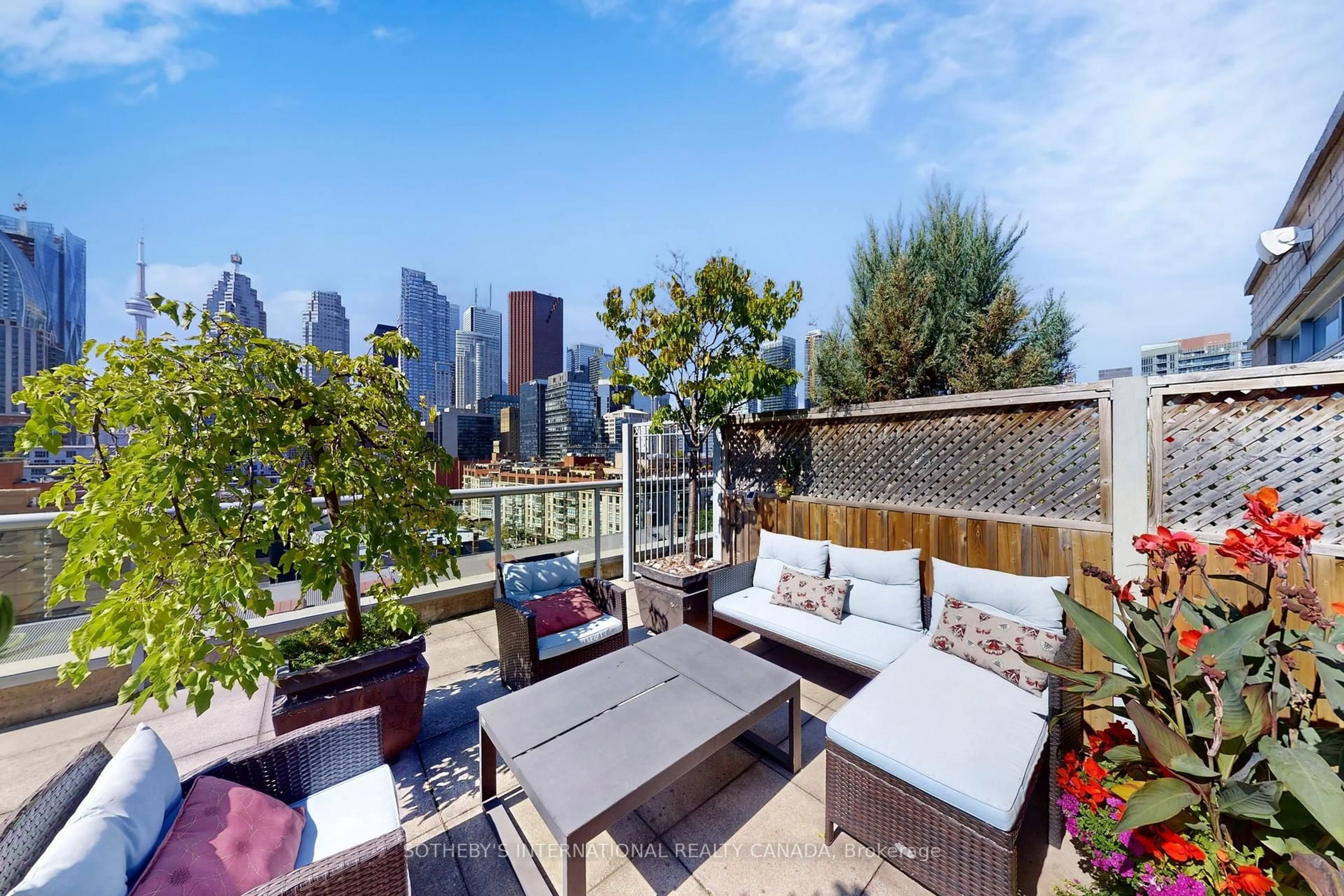 Patio, city buildings view from balcony for 109 Front St #PH39, Toronto Ontario M5A 4P7