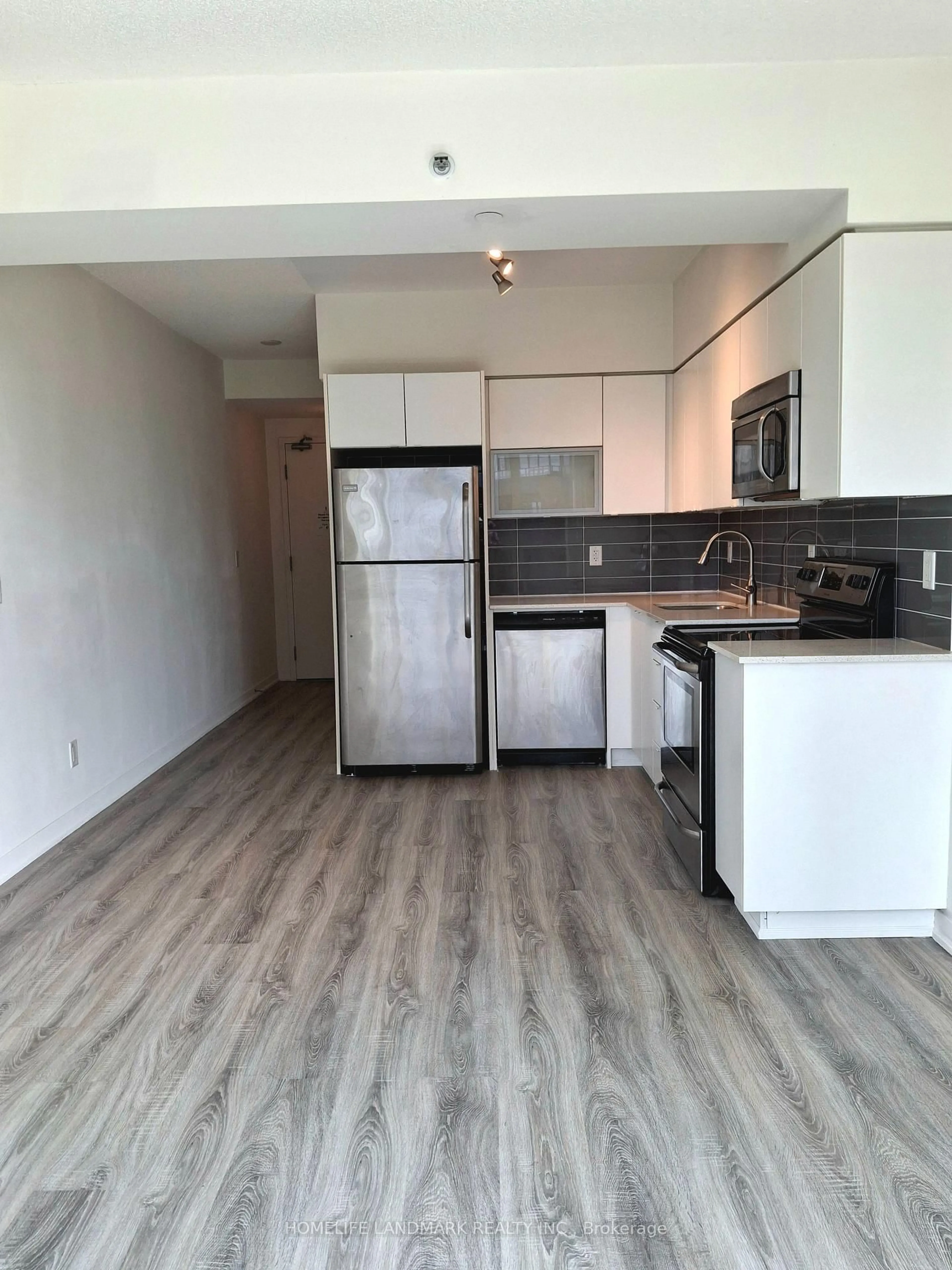 Standard kitchen, wood/laminate floor for 69 Lynn Williams St #405, Toronto Ontario M6K 3R6