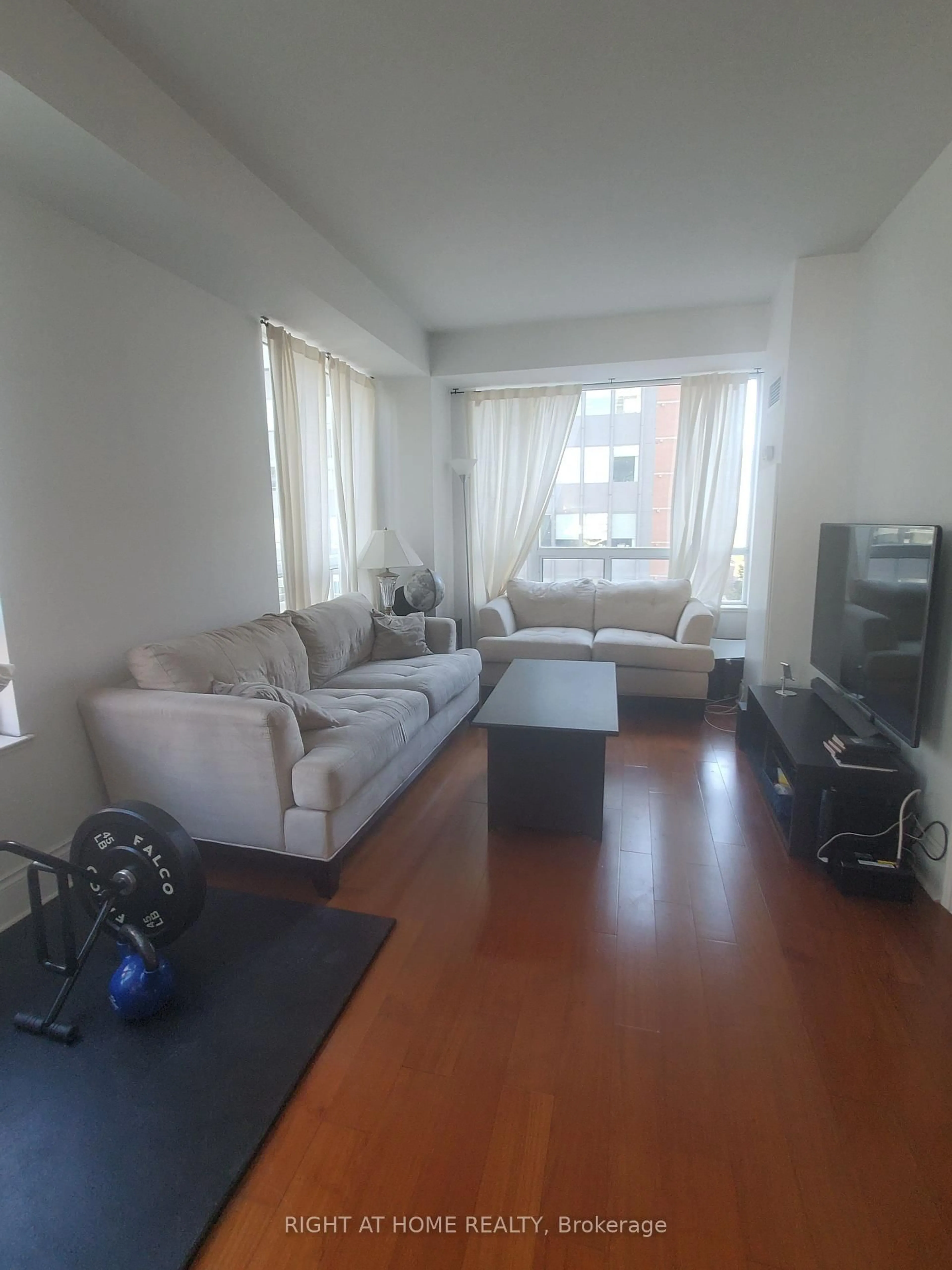 Living room with furniture, unknown for 102 Bloor St #809, Toronto Ontario M5S 1M8