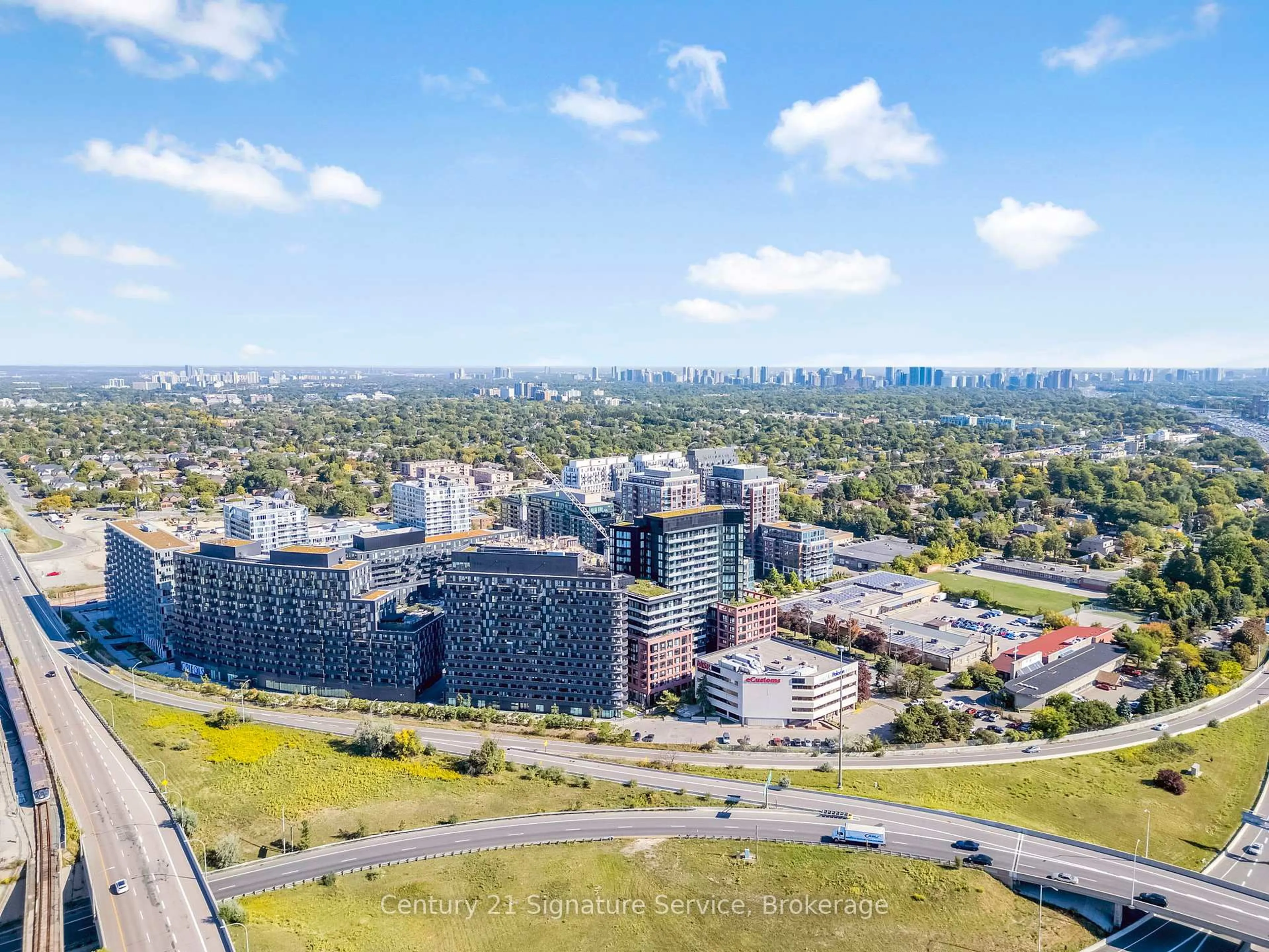 A pic from outside/outdoor area/front of a property/back of a property/a pic from drone, city buildings view from balcony for 8 Tippett Rd #803, Toronto Ontario M3H 0E7