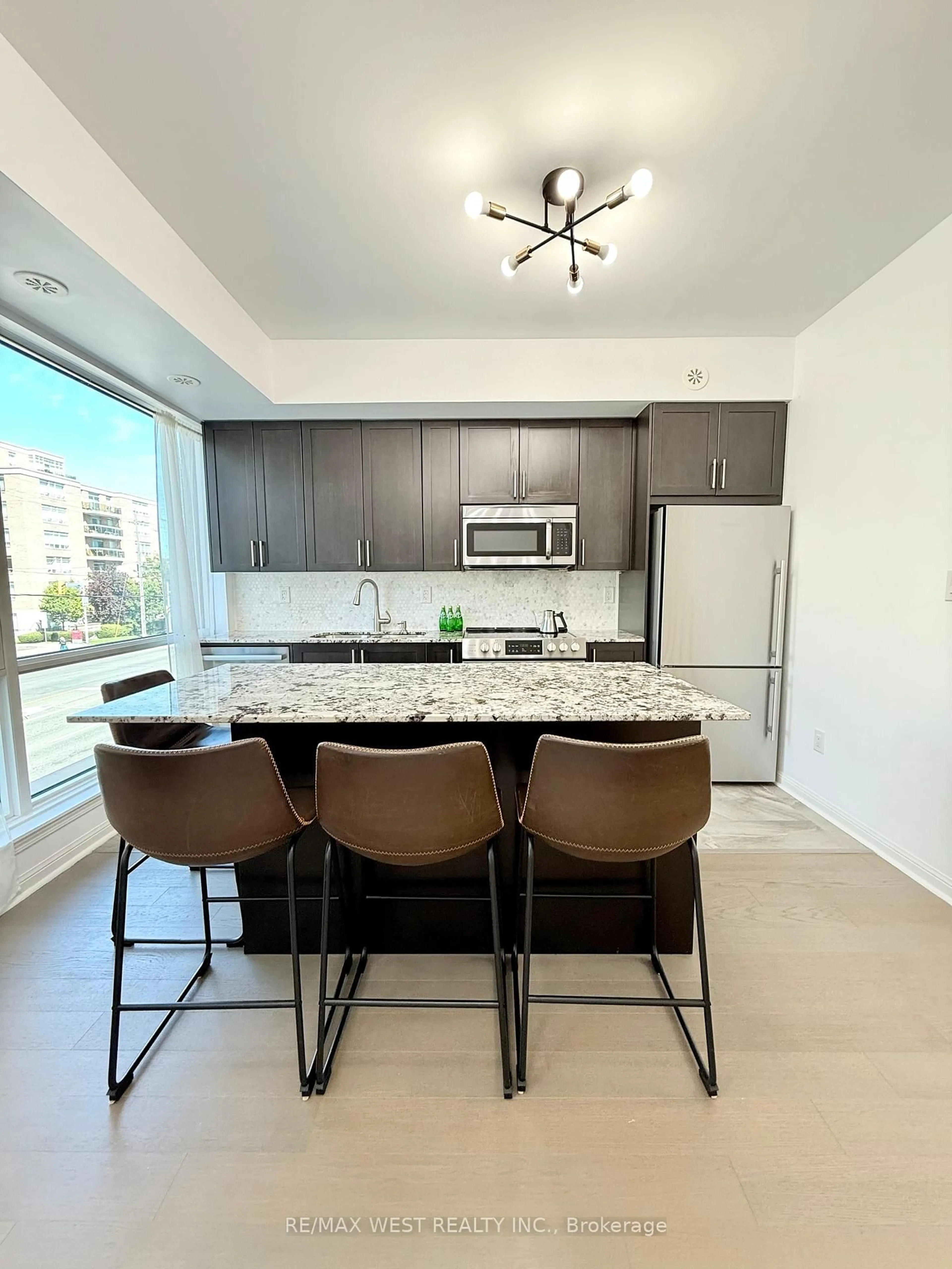 Open concept kitchen, unknown for 639 Lawrence Ave #310, Toronto Ontario M6A 1A9