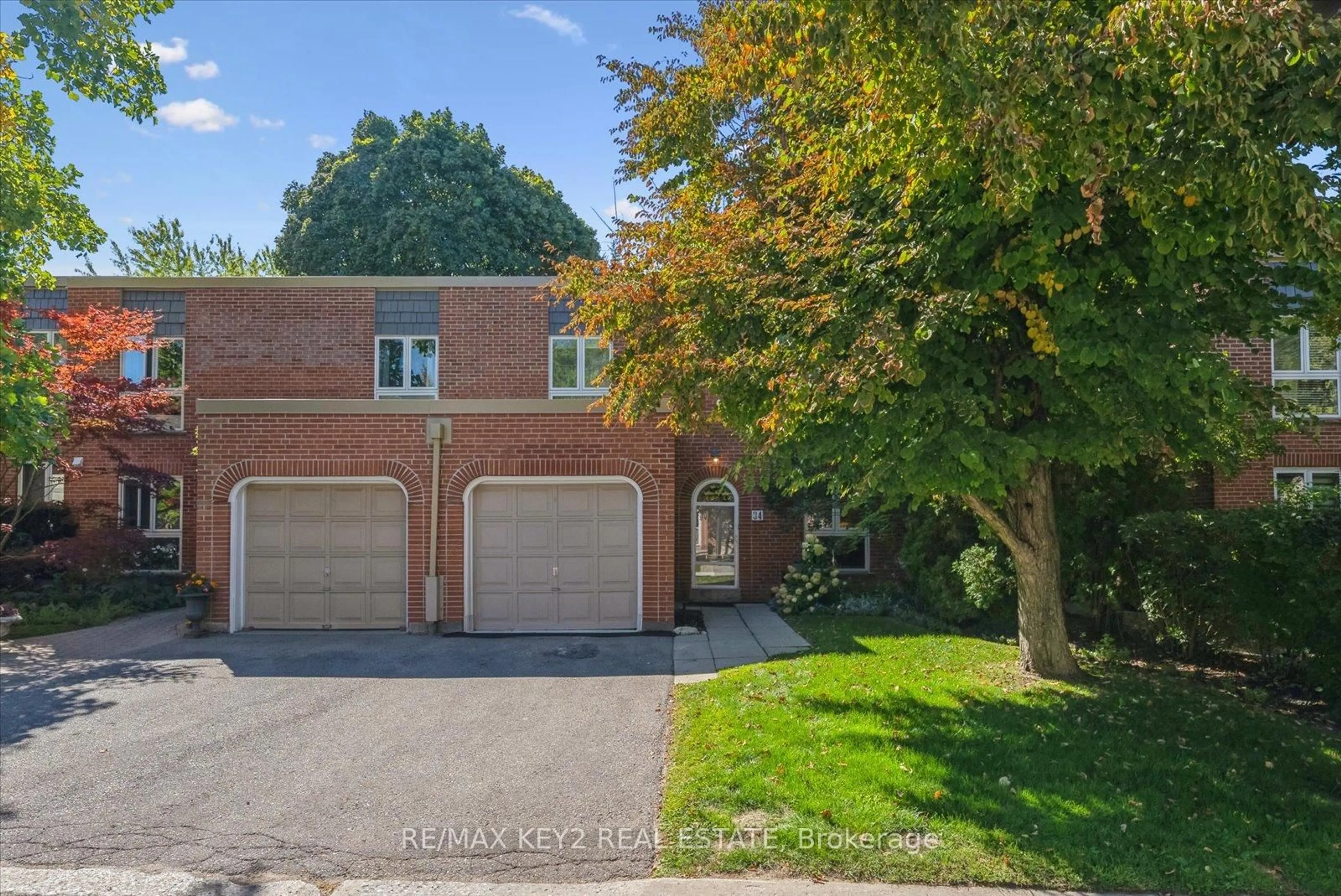 Home with brick exterior material, street for 34 Snowshoe Mill Way #201, Toronto Ontario M2L 1T5