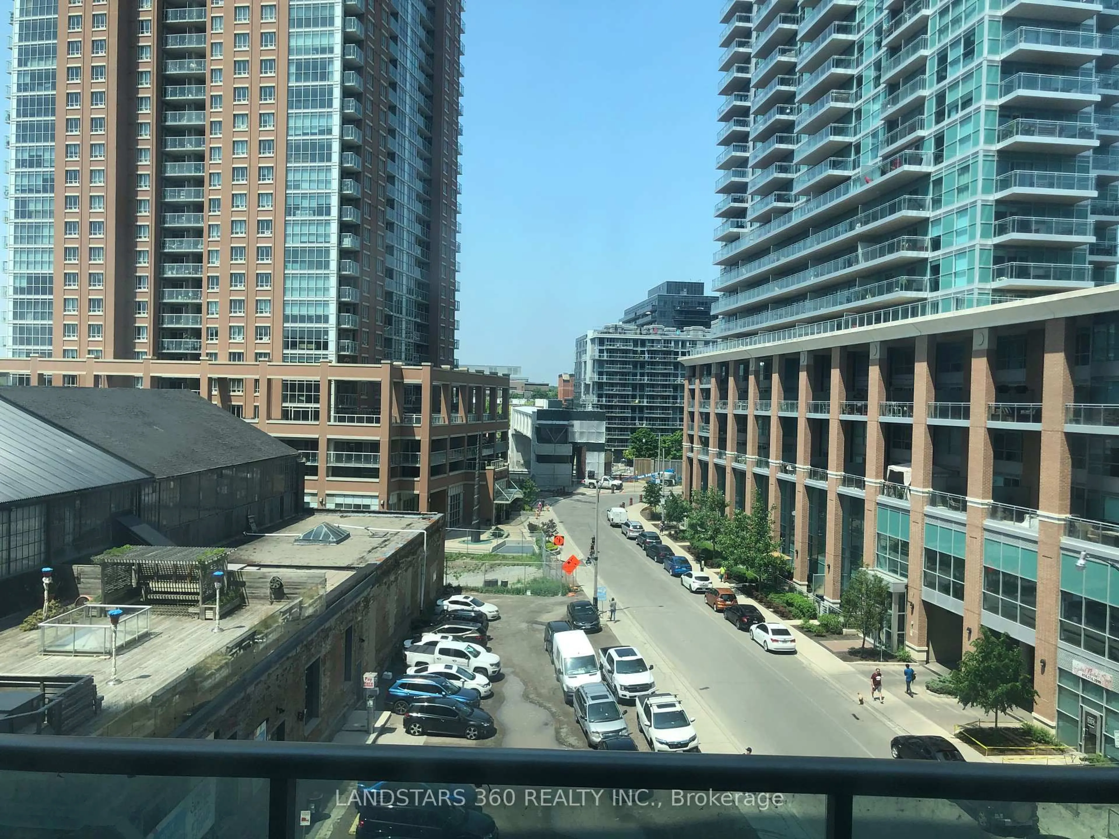 Patio, city buildings view from balcony for 150 East Liberty St #502, Toronto Ontario M6K 3R5