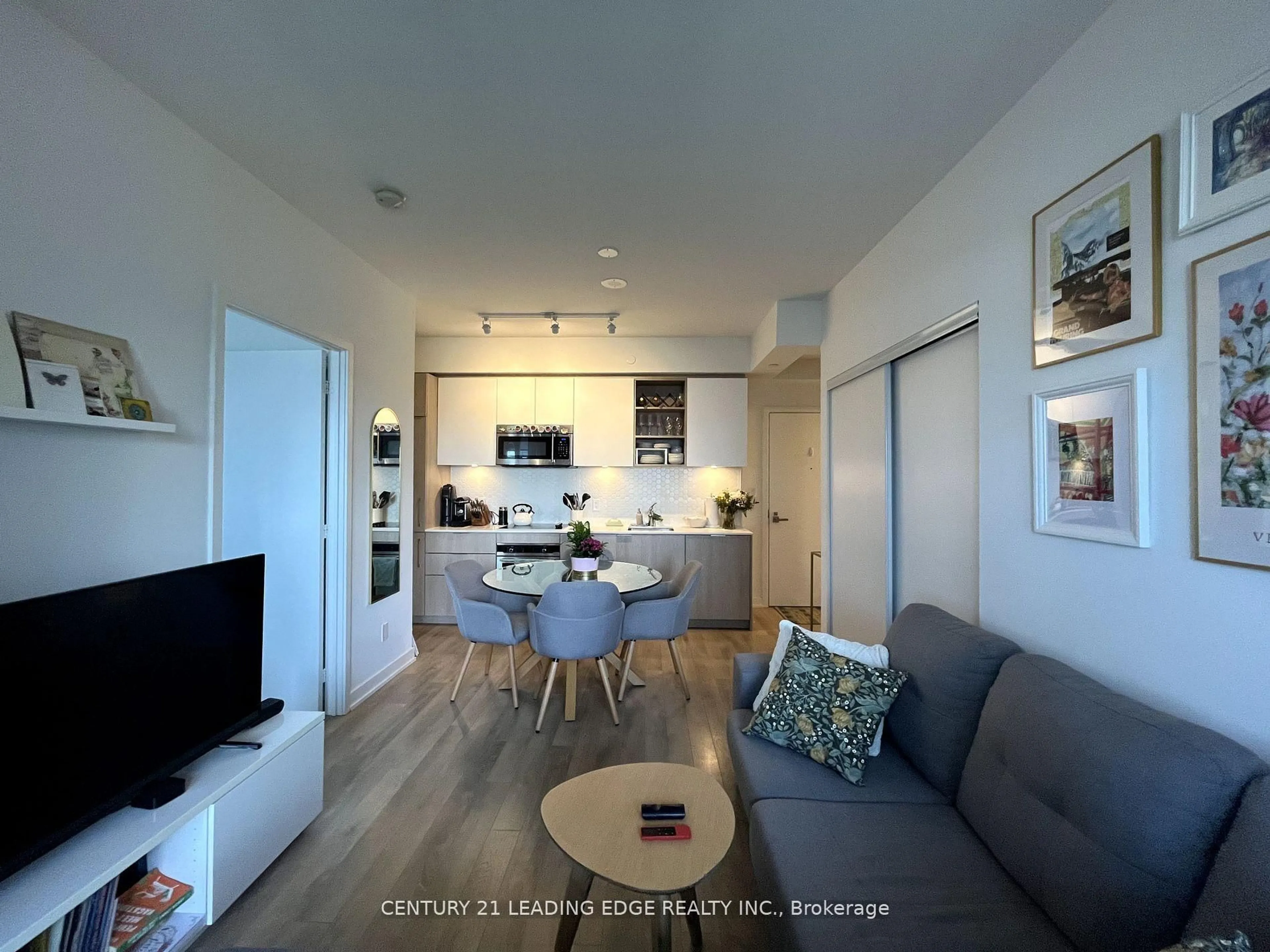 Living room with furniture, wood/laminate floor for 50 Ordnance St #1912, Toronto Ontario M6K 0C9
