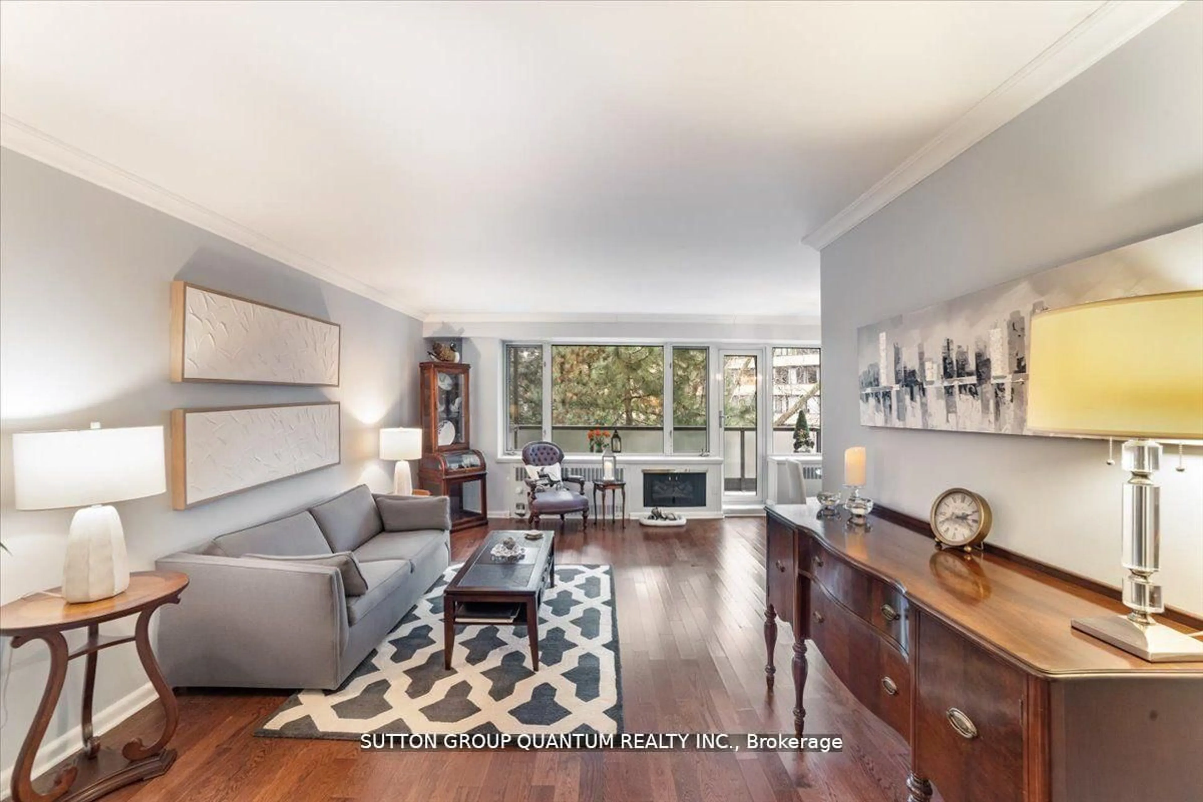 Living room with furniture, wood/laminate floor for 16 Rosedale Rd #614, Toronto Ontario M4W 2P4