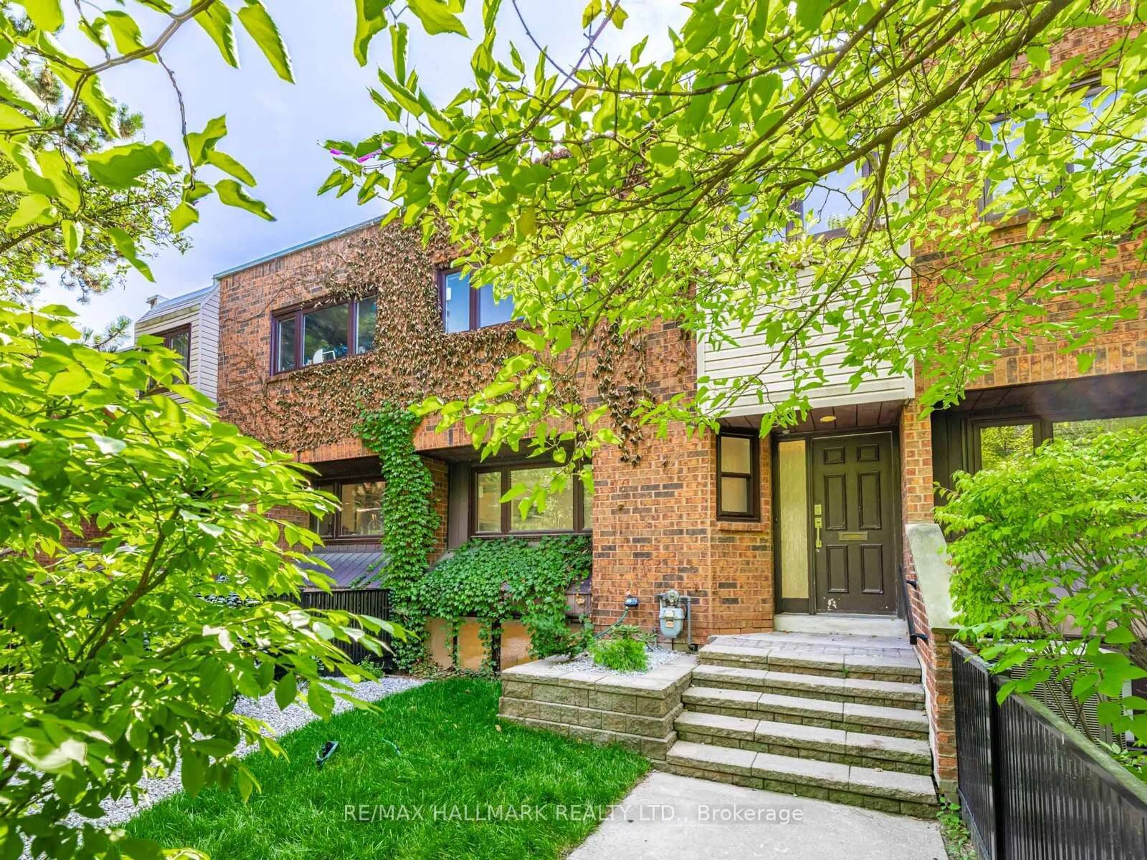 Home with brick exterior material, street for 1315 Steeles Ave #5, Toronto Ontario M2R 3N2