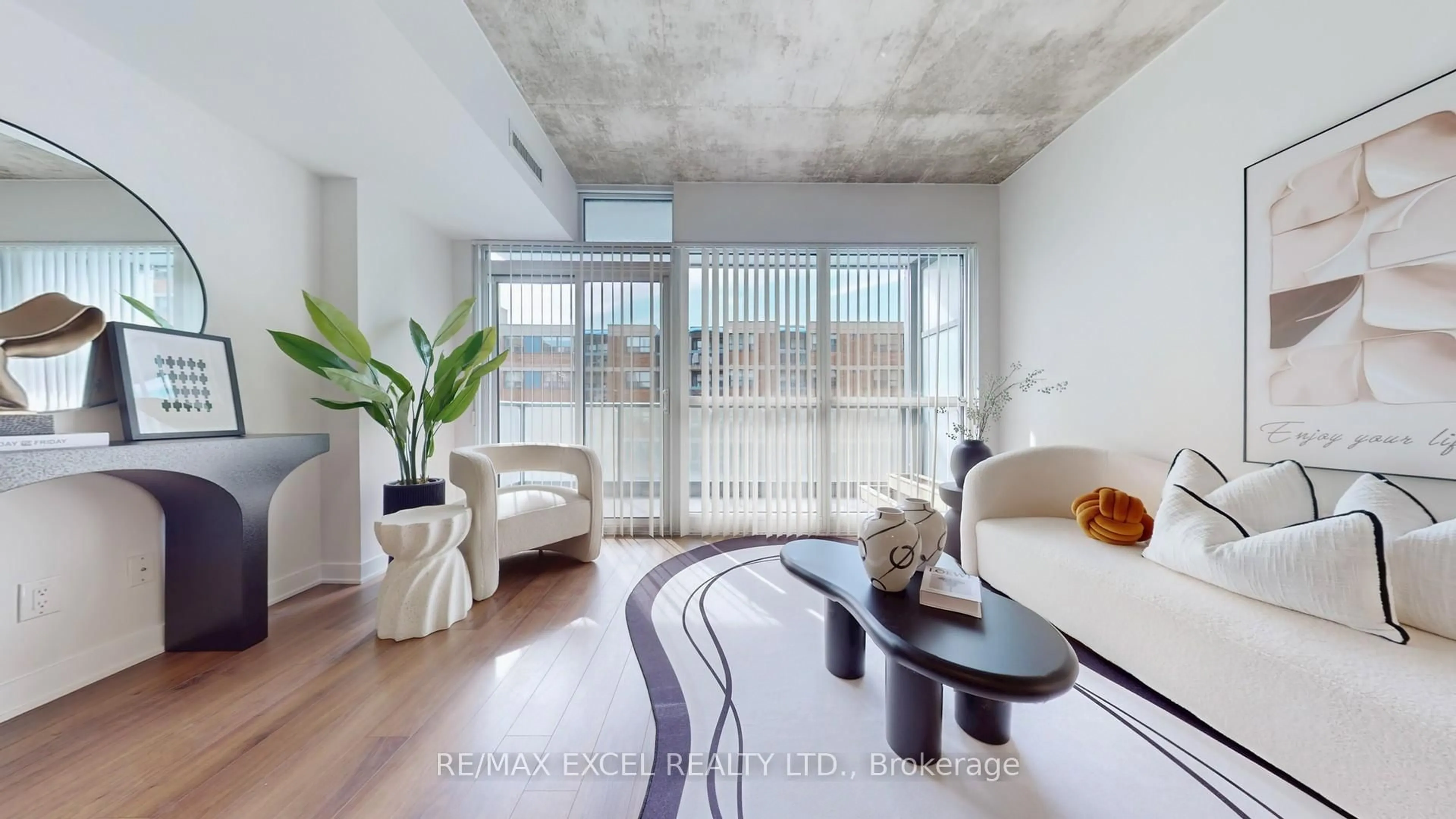 Living room with furniture, cement floor for 210 Simcoe St #704, Toronto Ontario M5T 1T4