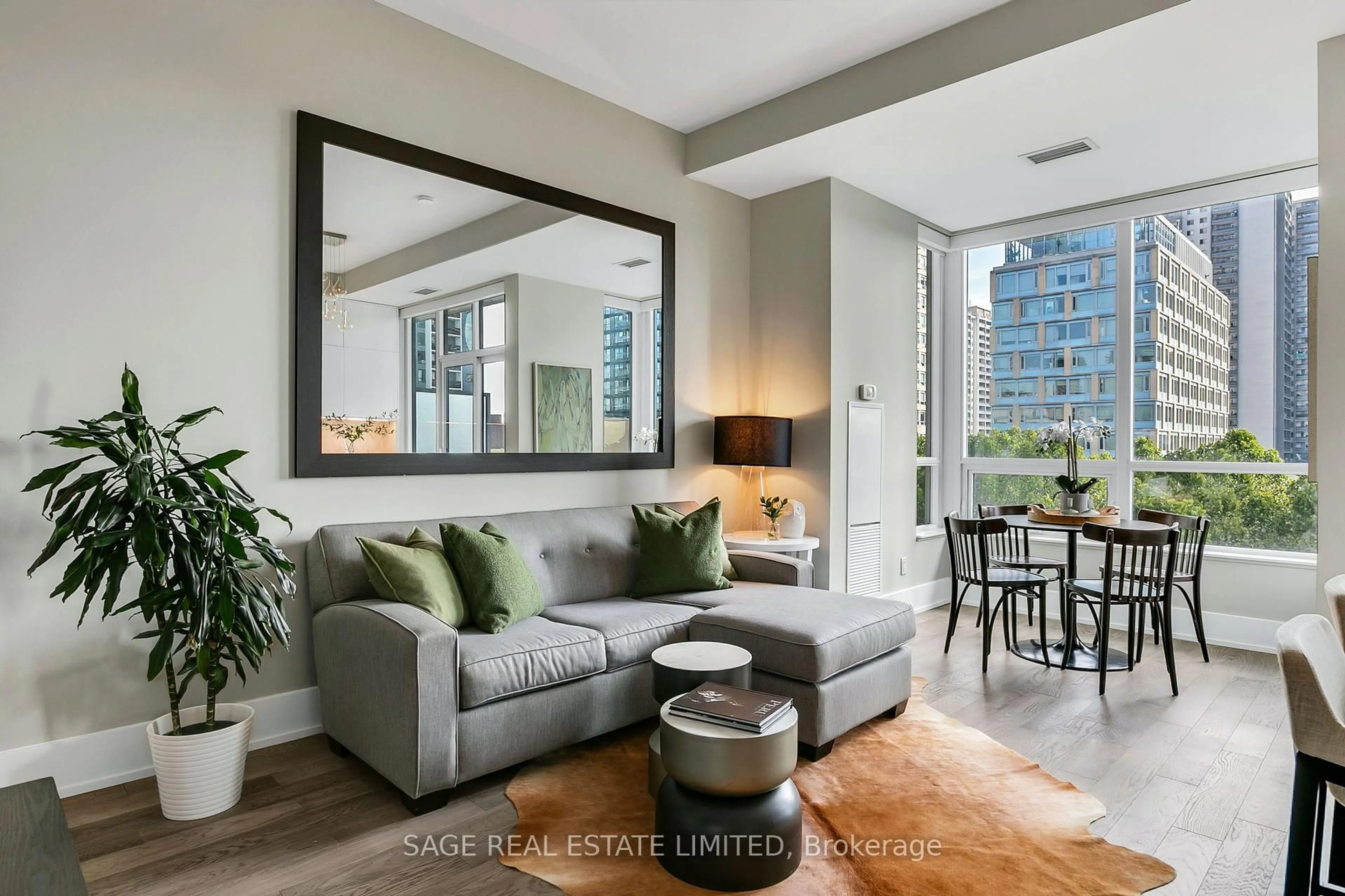Living room with furniture, unknown for 120 Homewood Ave #522, Toronto Ontario M4Y 2J3
