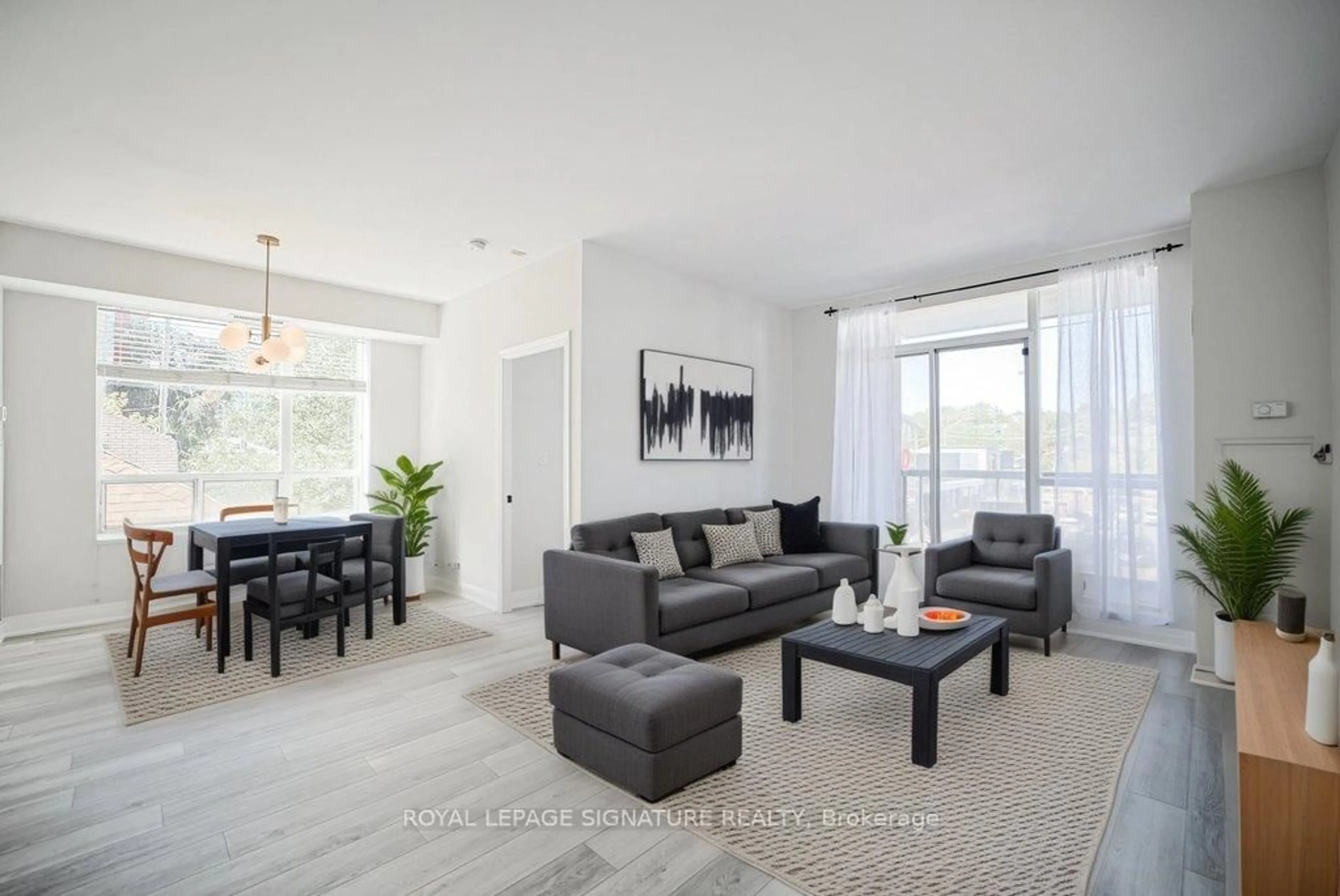 Living room with furniture, wood/laminate floor for 1750 Bayview Ave #309, Toronto Ontario M4G 4H6