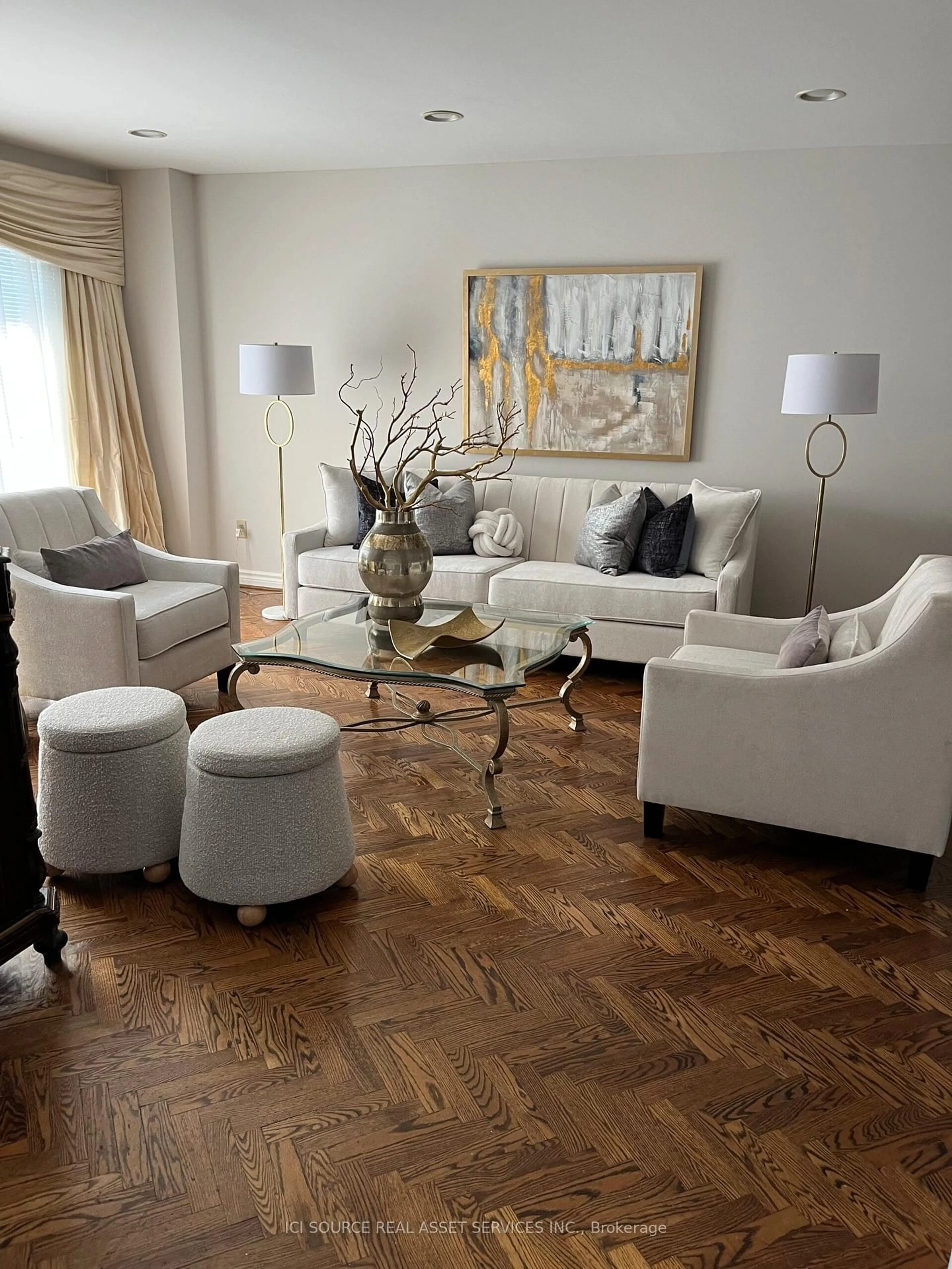 Living room with furniture, wood/laminate floor for 104 Almore Ave, Toronto Ontario M3H 2H5