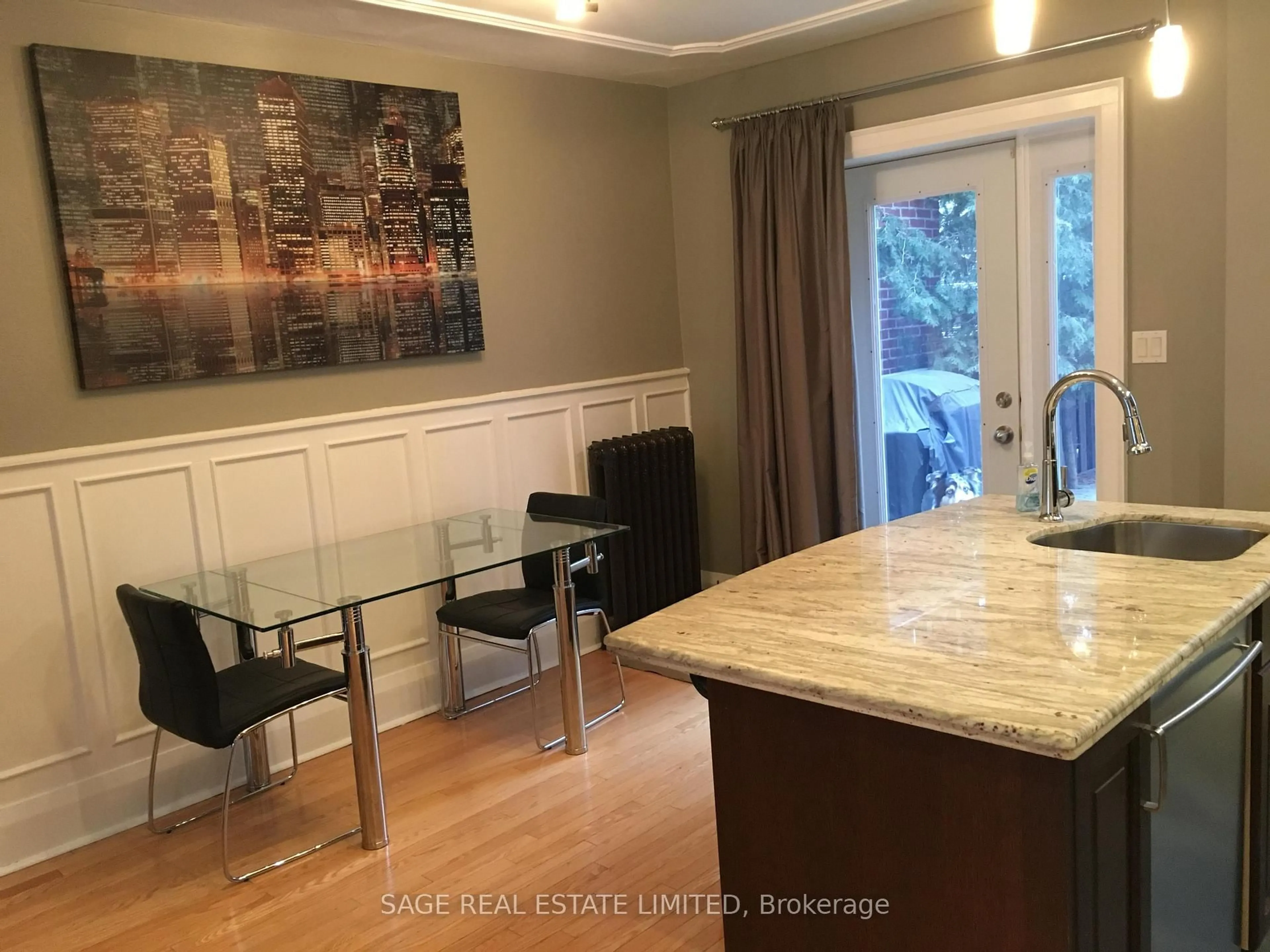 Open concept kitchen, wood/laminate floor for 569 Soudan Ave, Toronto Ontario M4S 1X1