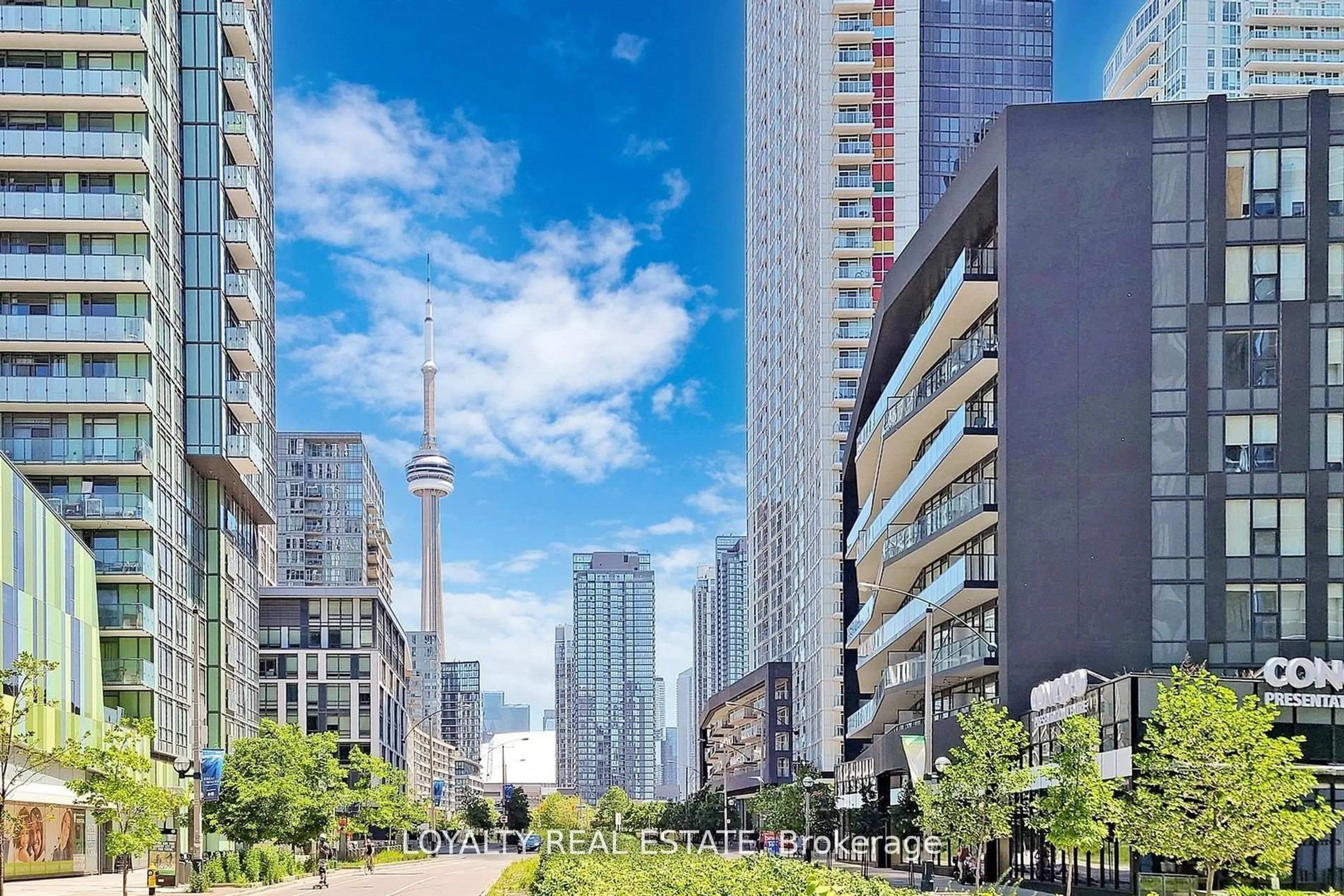 Patio, city buildings view from balcony for 70 Queens Wharf Rd #1803, Toronto Ontario M5V 0J2