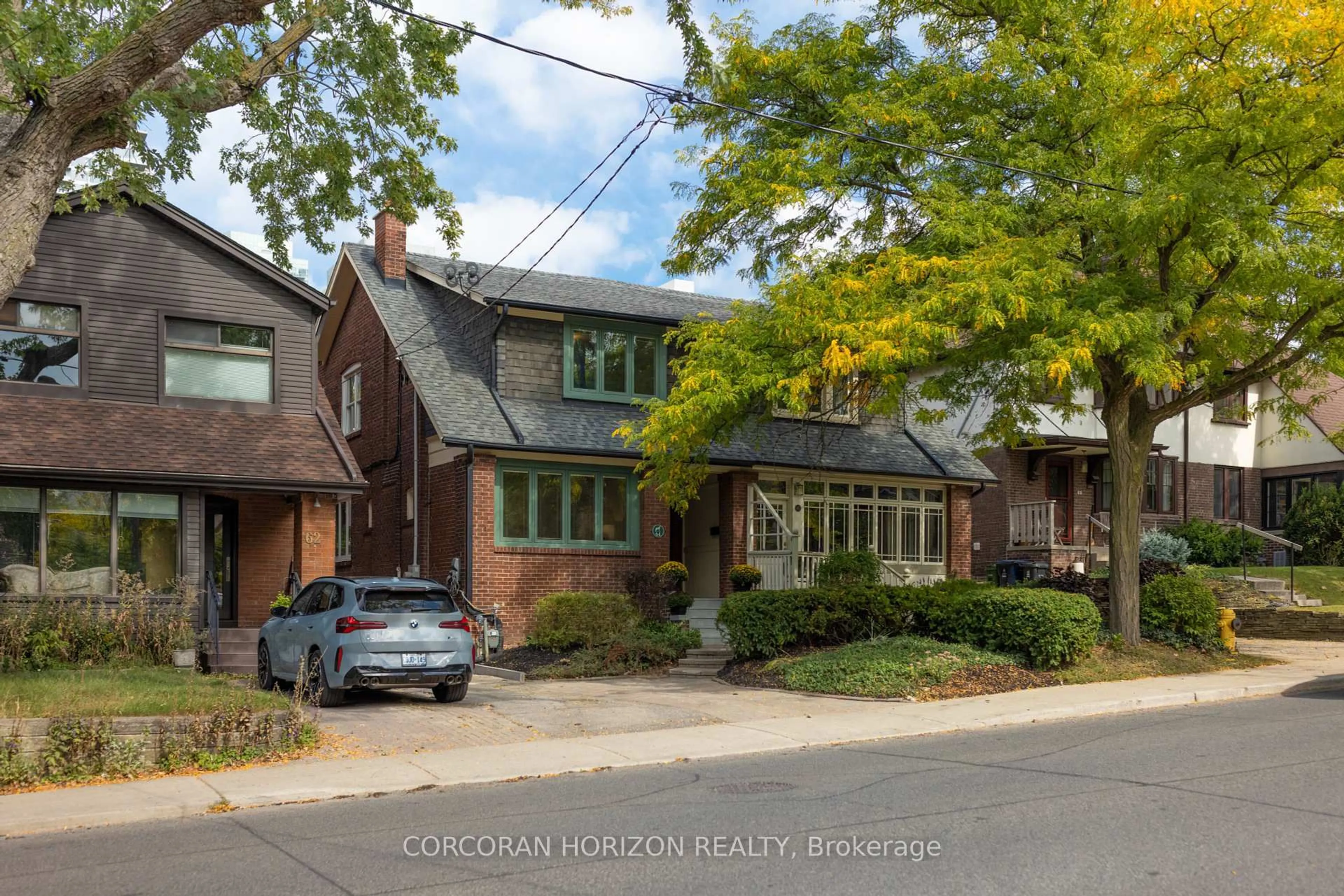 Home with brick exterior material, street for 64 Manor Rd, Toronto Ontario M4S 1P8