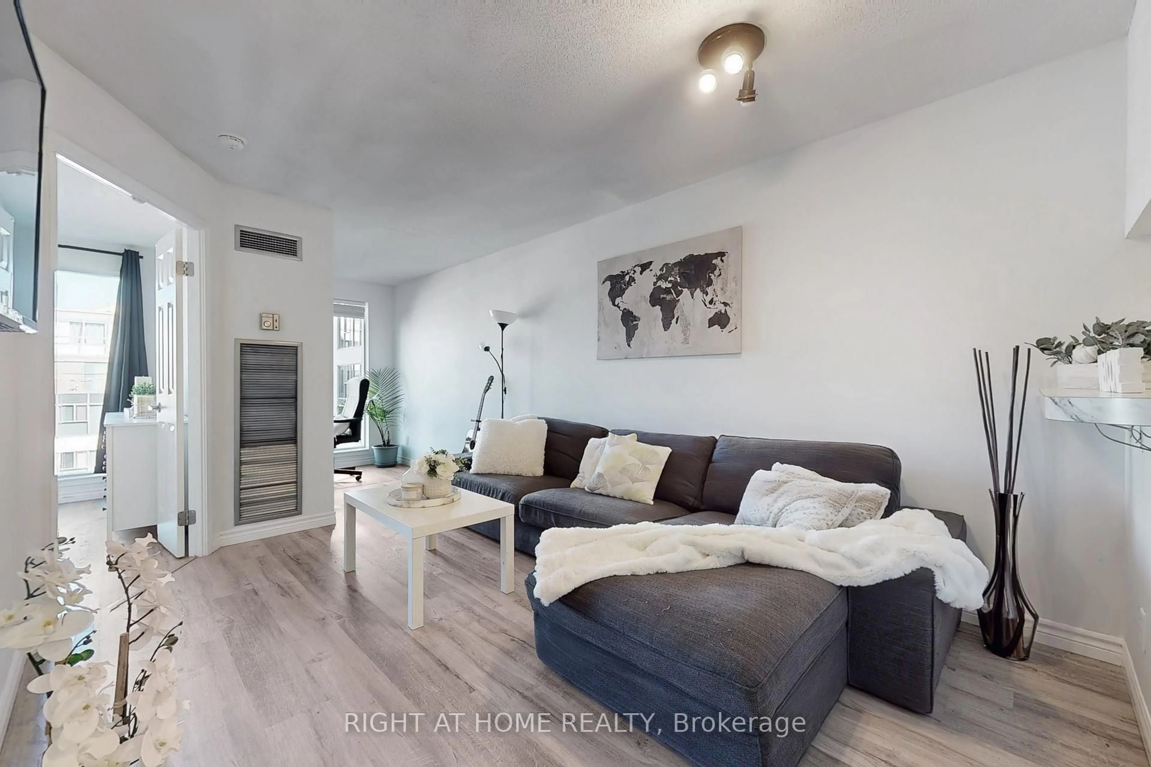 Living room with furniture, wood/laminate floor for 222 The Esplanade Ave #705, Toronto Ontario M5A 4M8