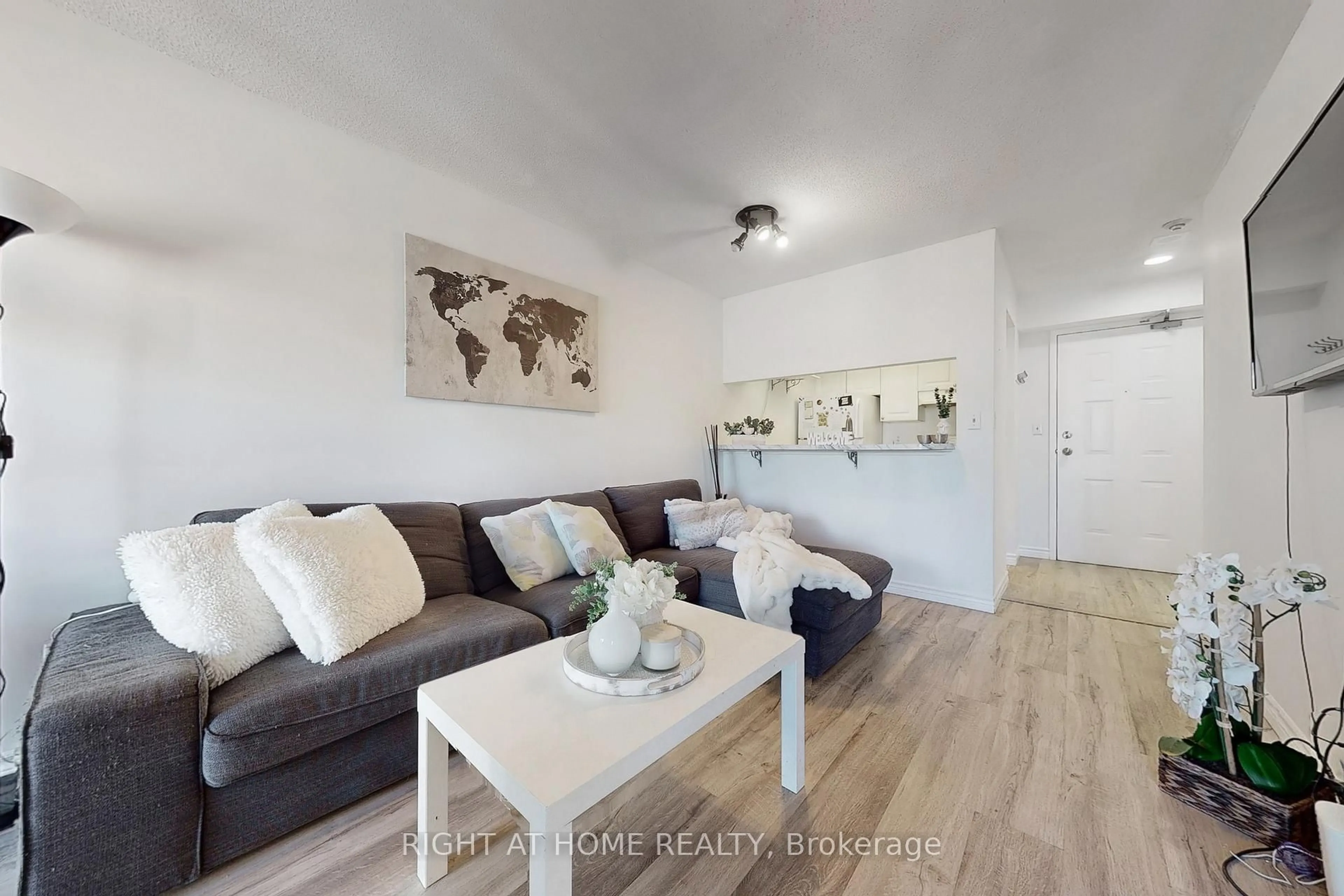Living room with furniture, wood/laminate floor for 222 The Esplanade Ave #705, Toronto Ontario M5A 4M8