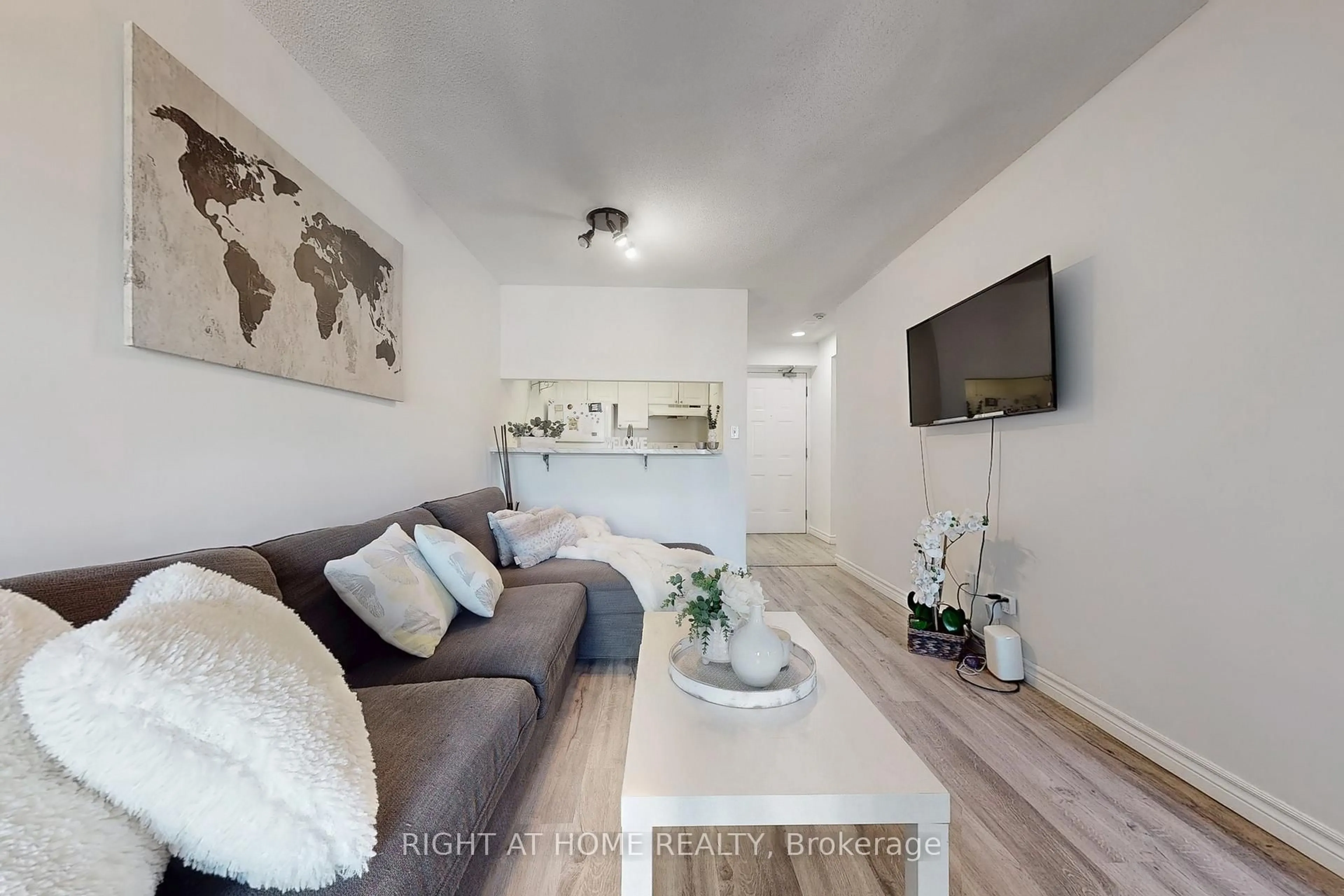 Living room with furniture, wood/laminate floor for 222 The Esplanade Ave #705, Toronto Ontario M5A 4M8