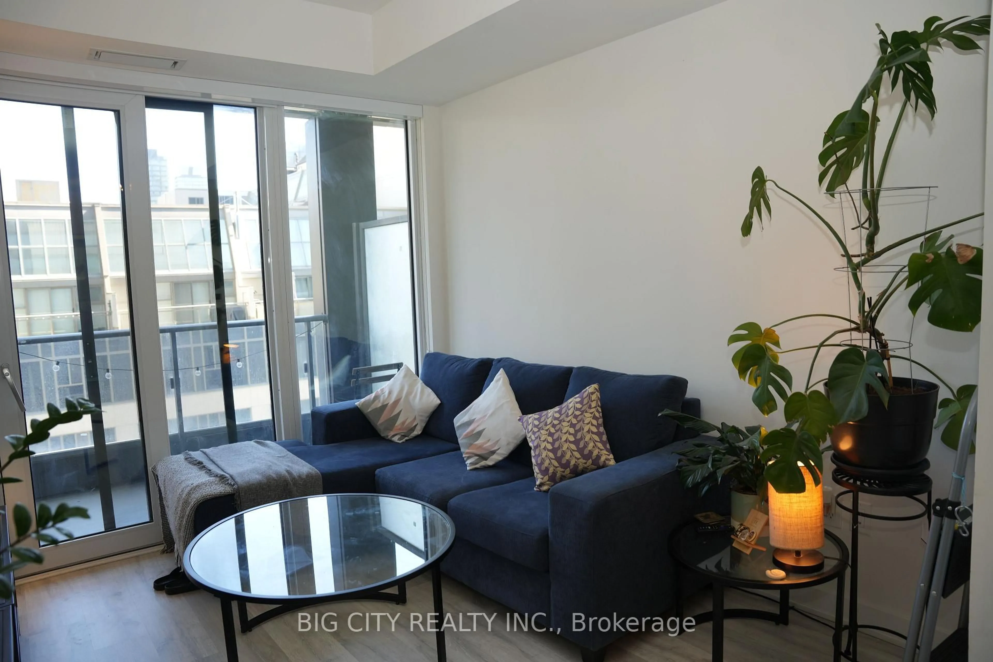 Living room with furniture, unknown for 60 Princess St #716, Toronto Ontario M5A 2C7
