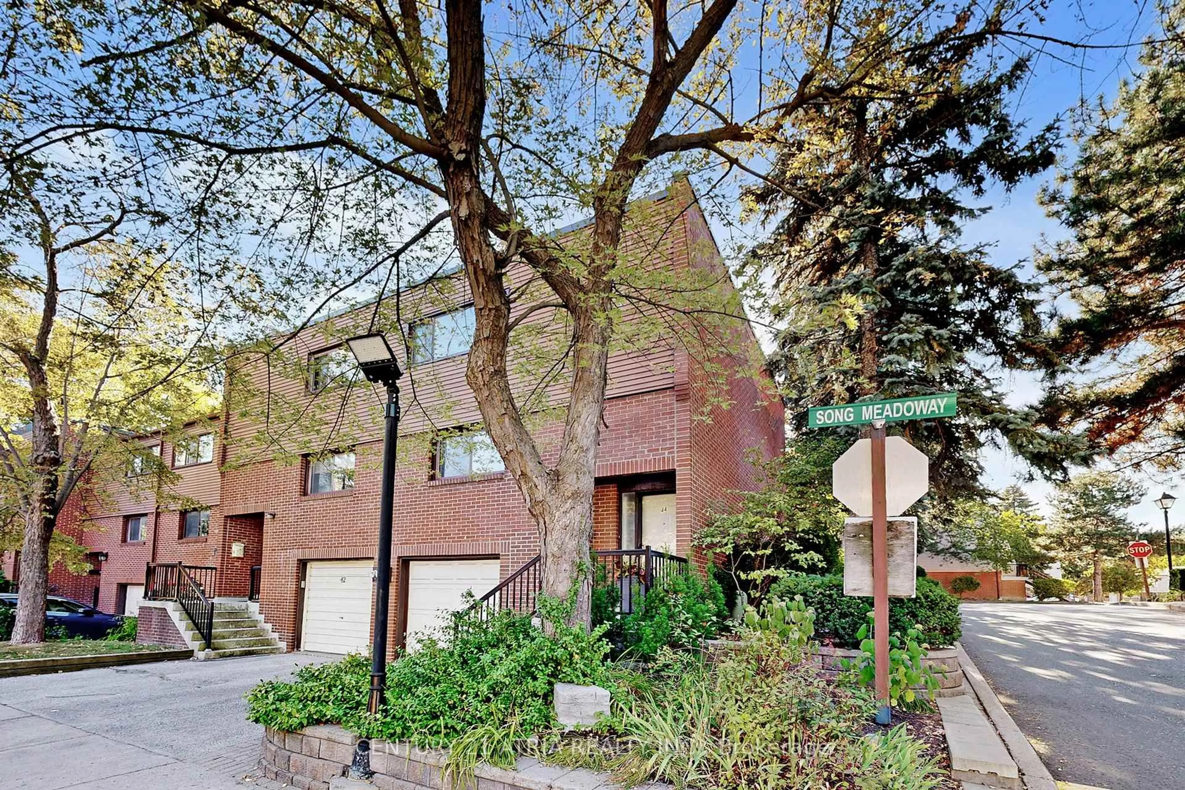 Home with brick exterior material, street for 44 Song Meadoway, Toronto Ontario M2H 2T7