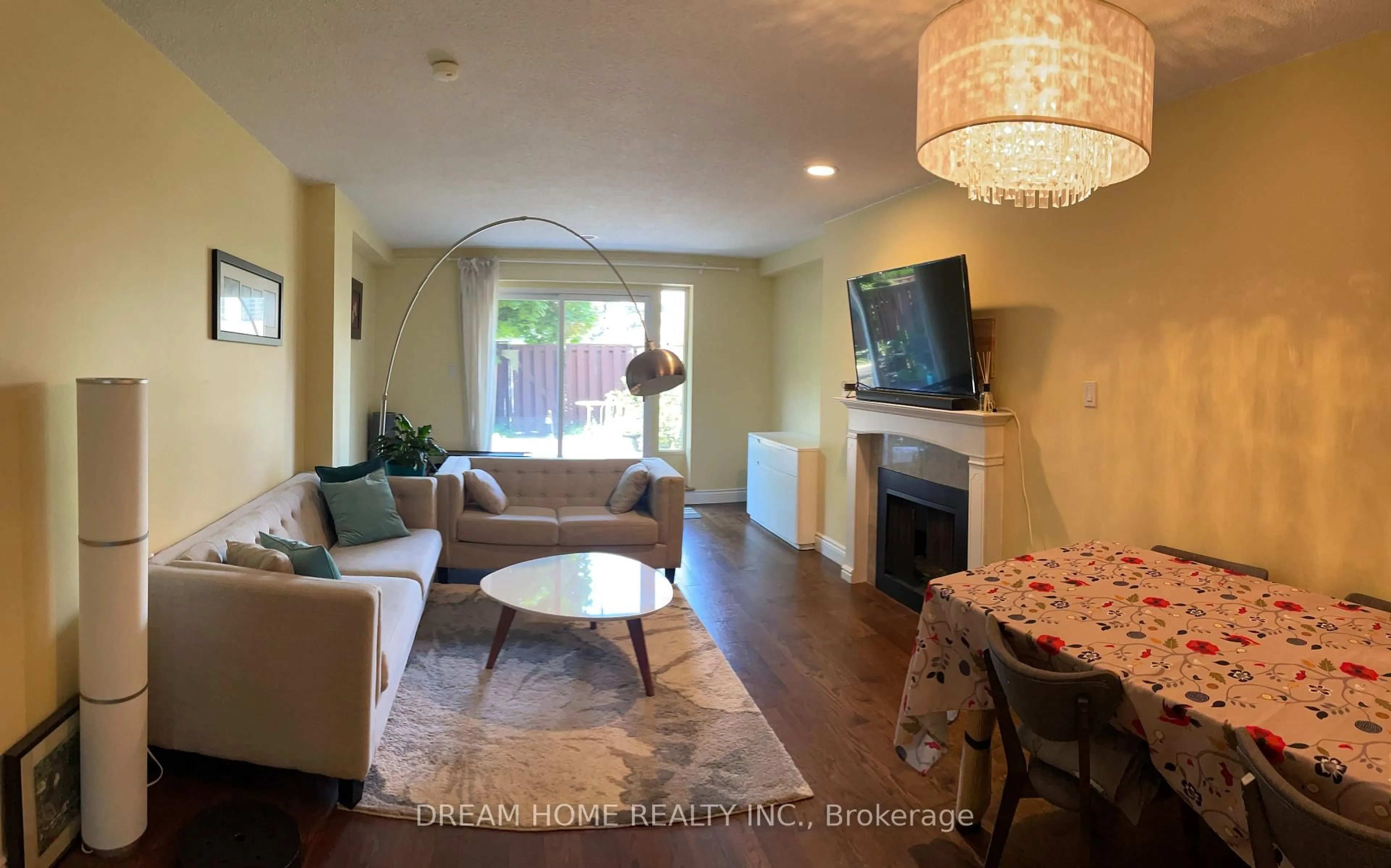 Living room with furniture, wood/laminate floor for 74 Upper Canada Dr #6, Toronto Ontario M2P 2A3