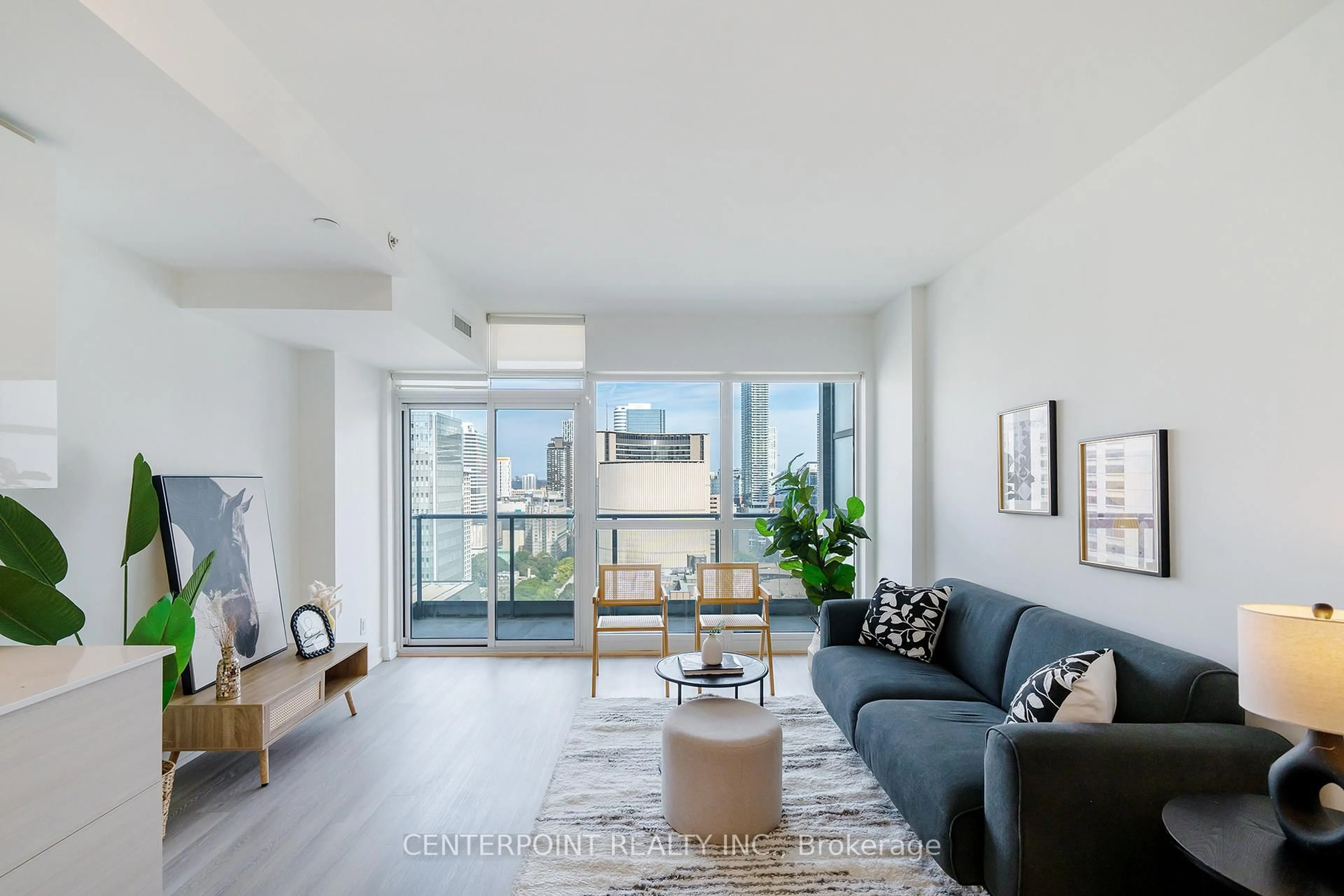 Living room with furniture, unknown for 210 Simcoe St #2305, Toronto Ontario M5T 1T4