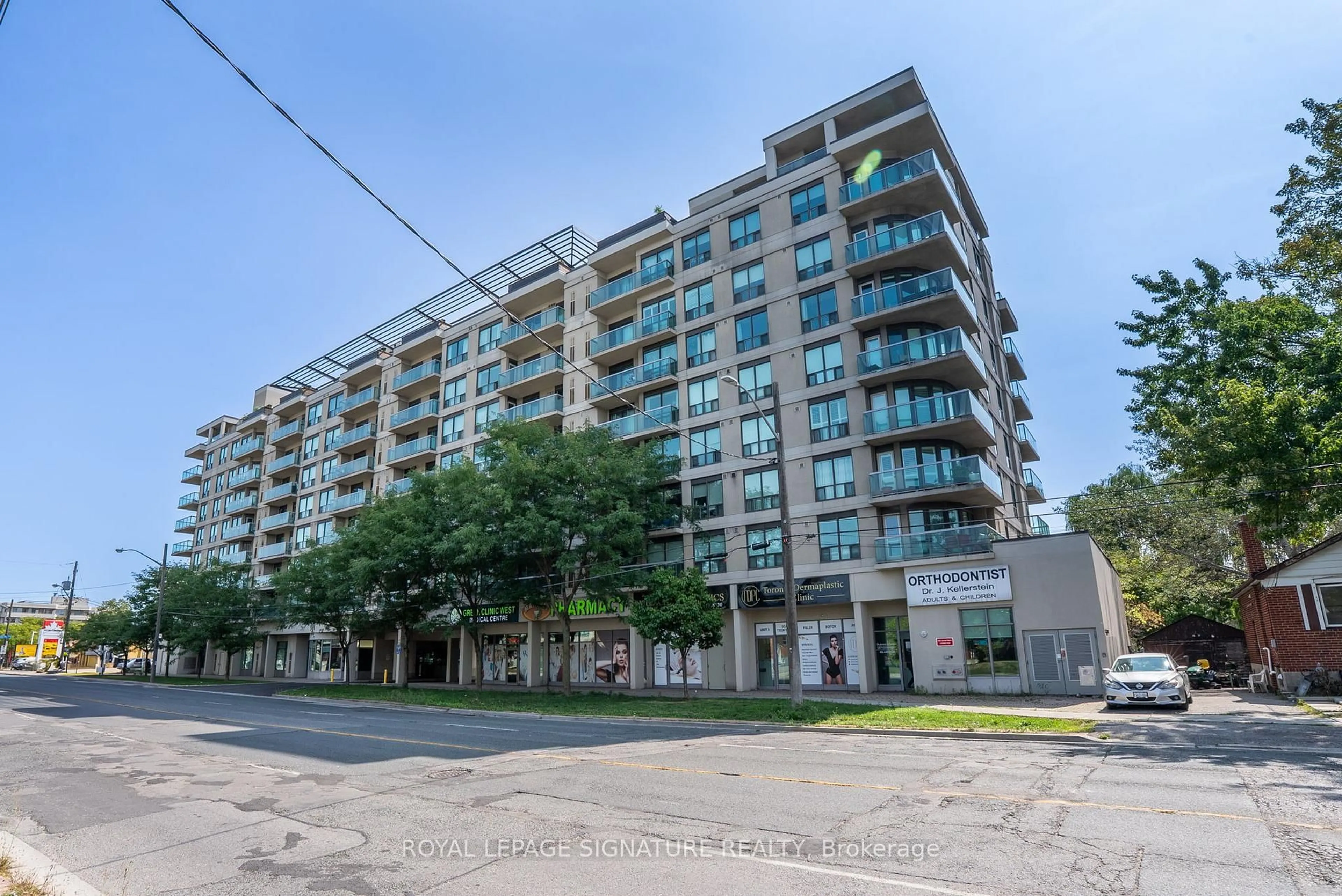 A pic from outside/outdoor area/front of a property/back of a property/a pic from drone, building for 935 Sheppard Ave #402, Toronto Ontario M3H 2T7