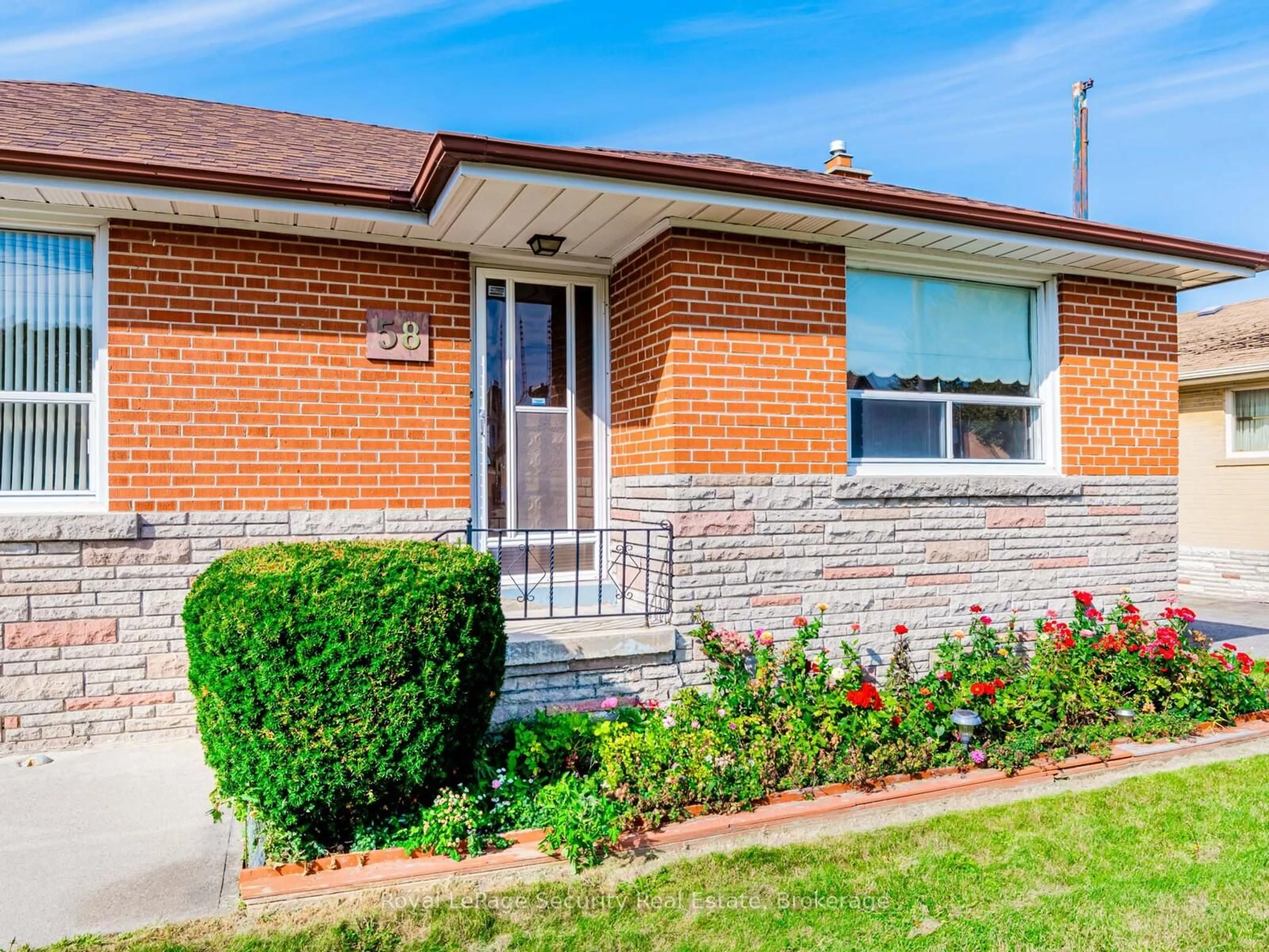 Home with brick exterior material, street for 58 Saddle Ridge Dr, Toronto Ontario M4A 1Z7