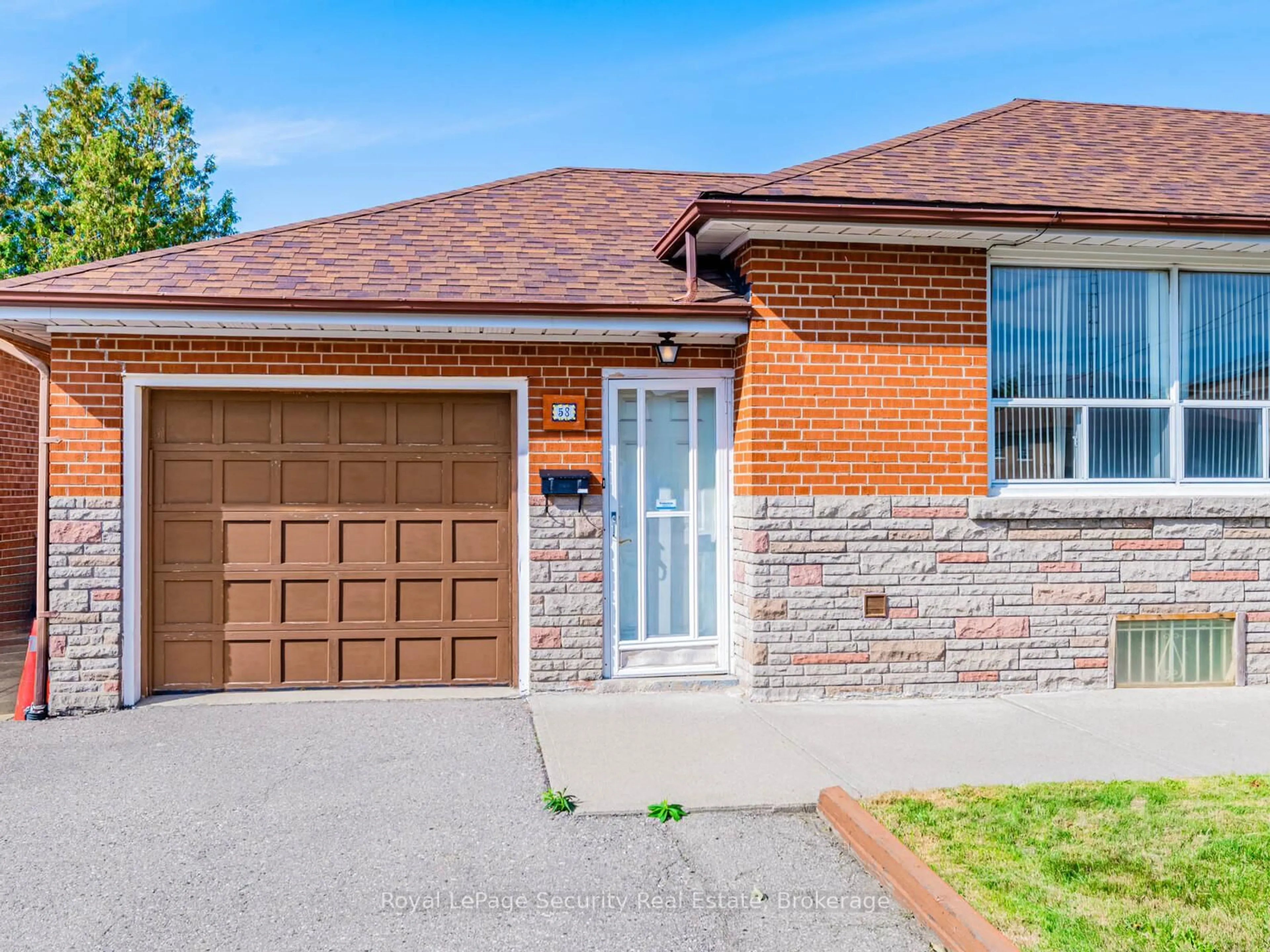 Home with brick exterior material, street for 58 Saddle Ridge Dr, Toronto Ontario M4A 1Z7