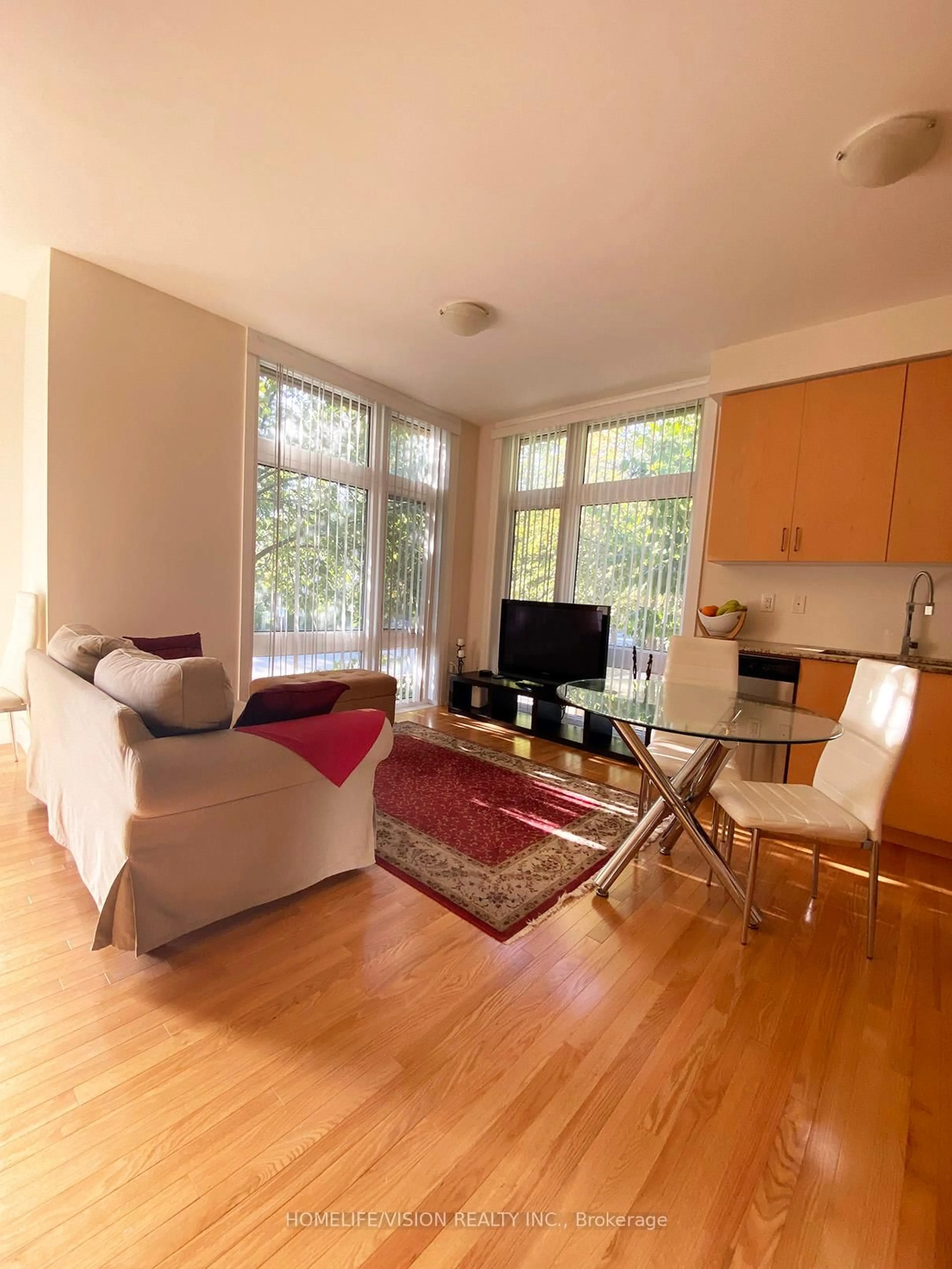 Living room with furniture, wood/laminate floor for 23 Eldora Ave #70, Toronto Ontario M2M 0B5